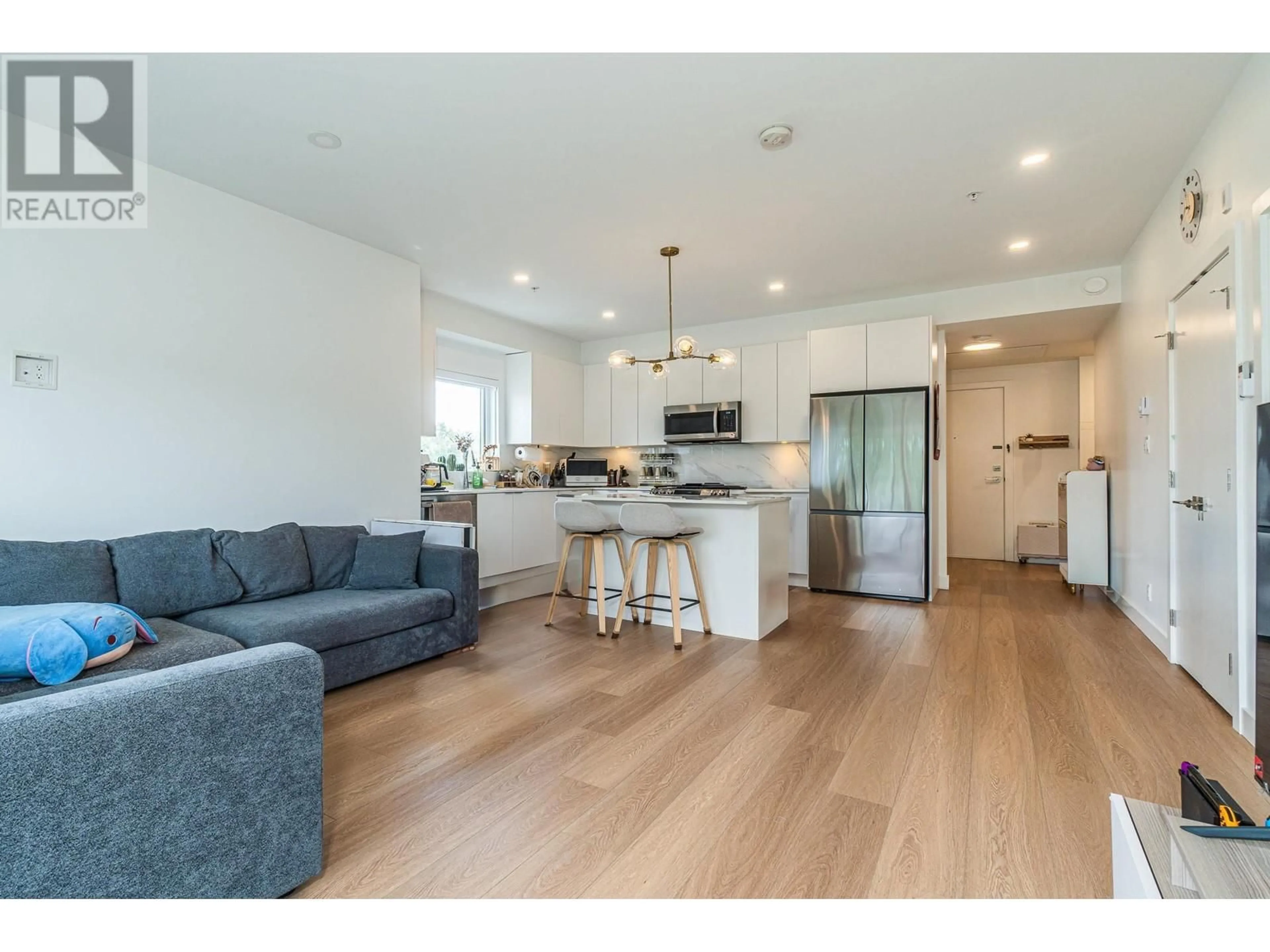 Open concept kitchen, wood/laminate floor for 501 2331 KELLY AVENUE, Port Coquitlam British Columbia V3C0T4