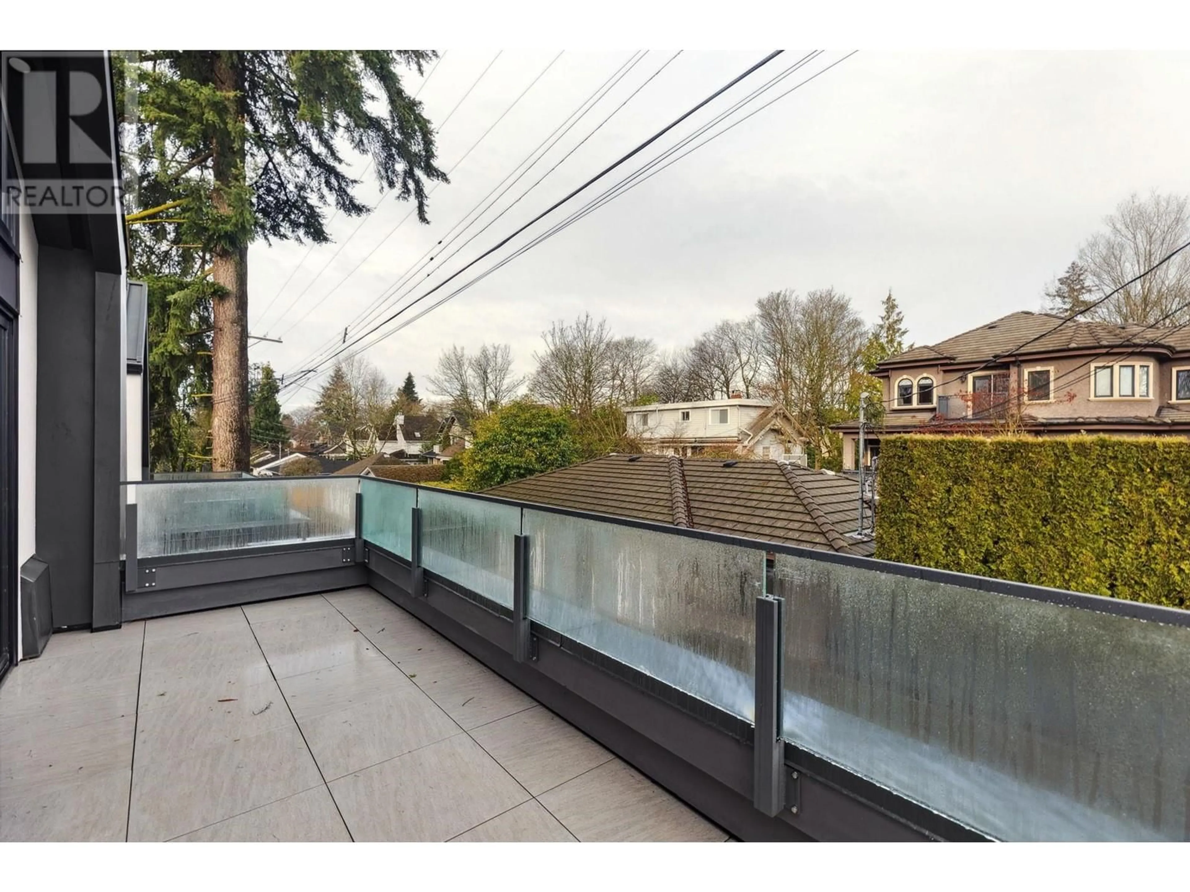 Patio, city buildings view from balcony for 5253 LARCH STREET, Vancouver British Columbia V6N2T3