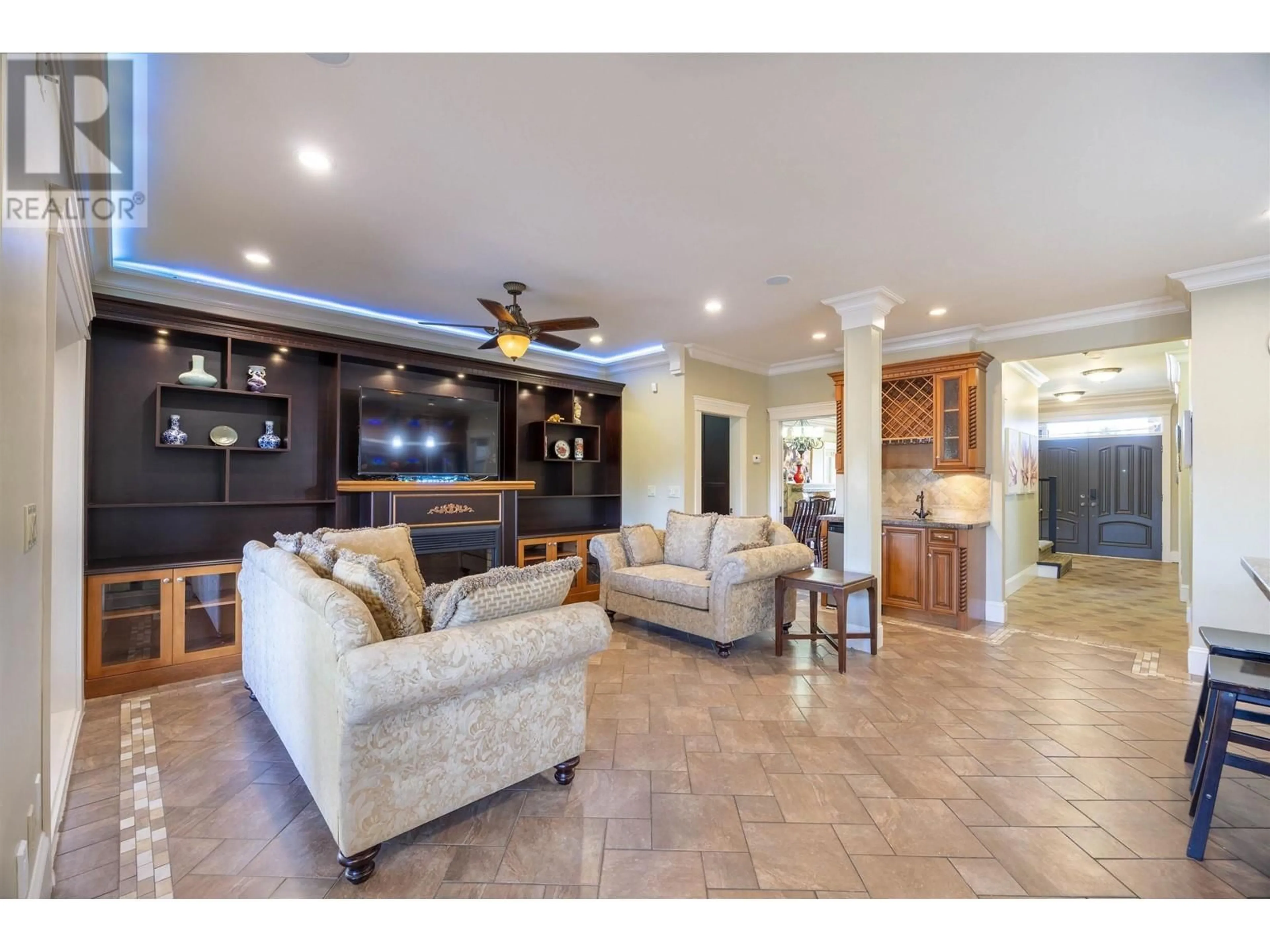 Living room with furniture, ceramic/tile floor for 7307 2ND STREET, Burnaby British Columbia V3N3P9