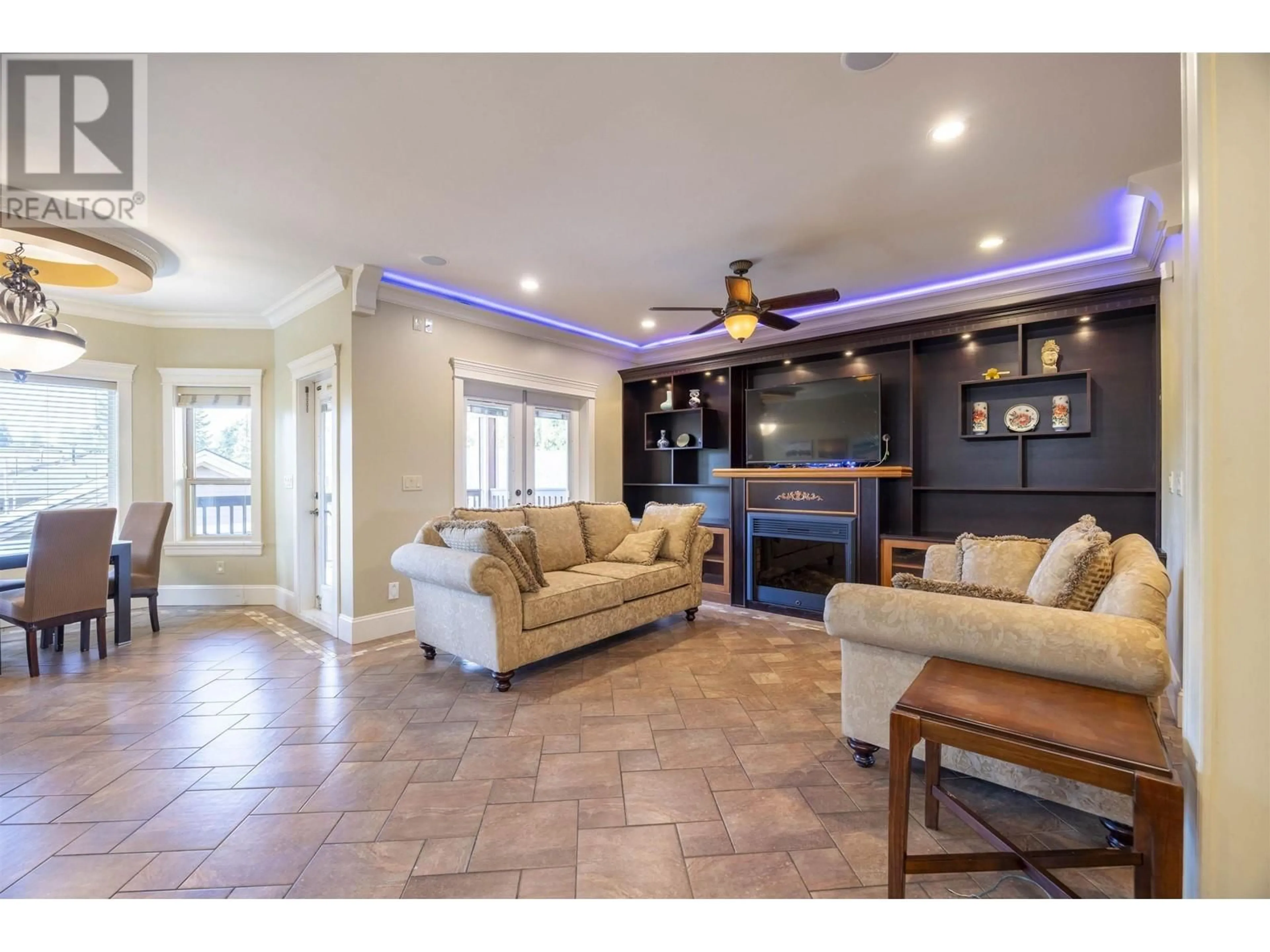 Living room with furniture, ceramic/tile floor for 7307 2ND STREET, Burnaby British Columbia V3N3P9