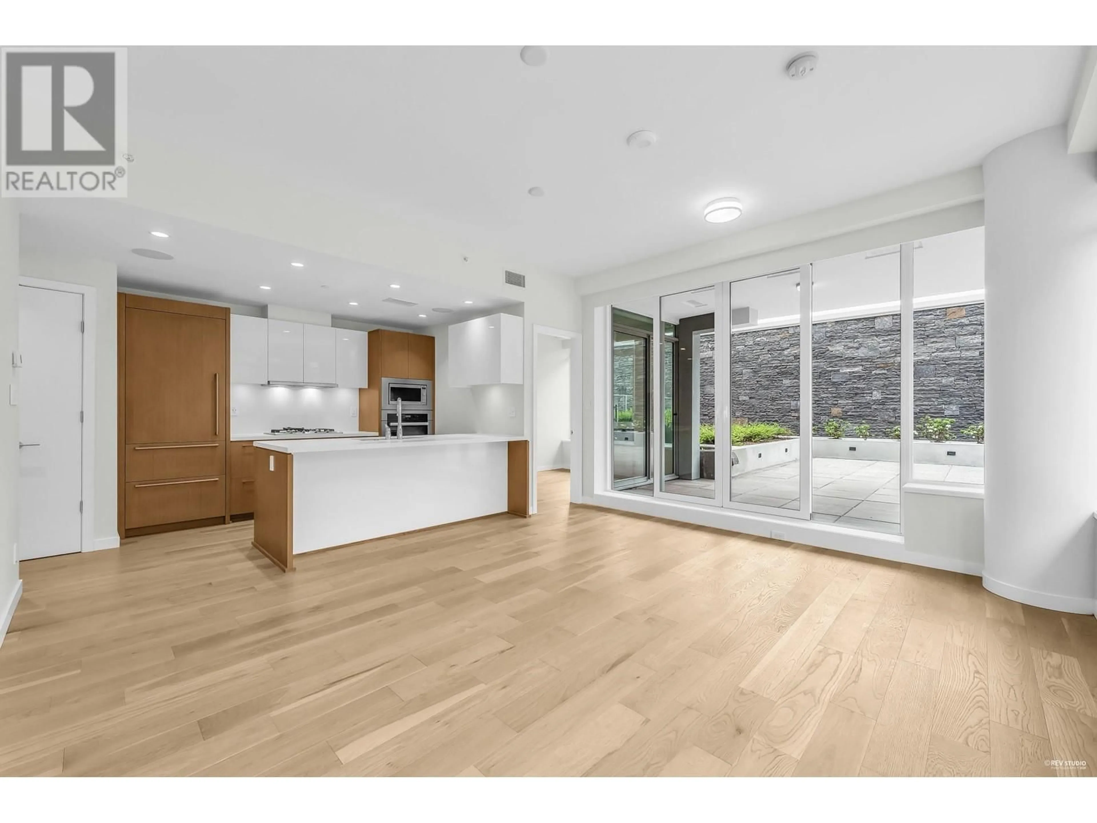 Open concept kitchen, wood/laminate floor for 507 788 ARTHUR ERICKSON PLACE, West Vancouver British Columbia V7T0B6