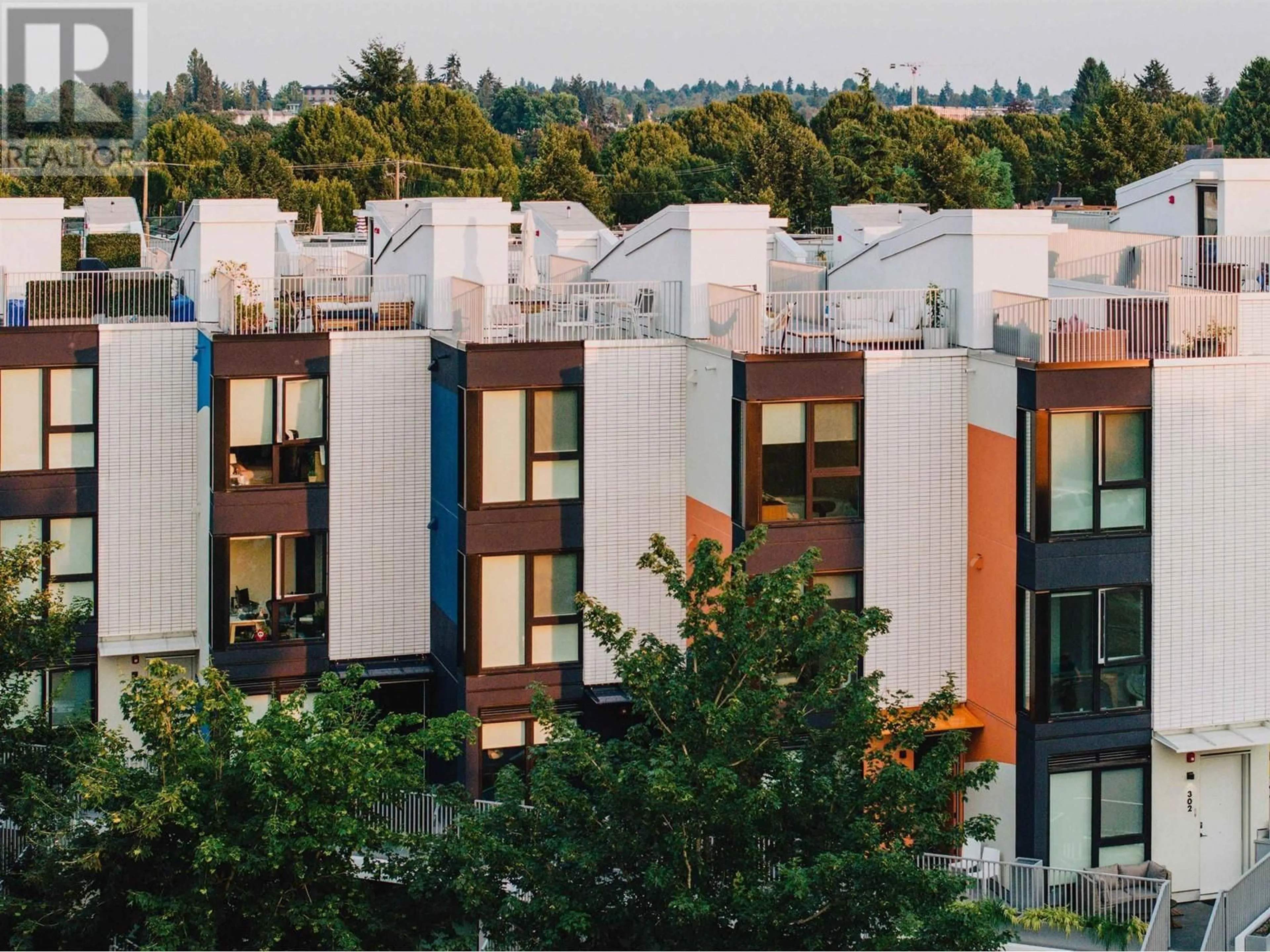 Home with vinyl exterior material, city buildings view from balcony for 212 322 E 15TH AVENUE, Vancouver British Columbia V5T0K5