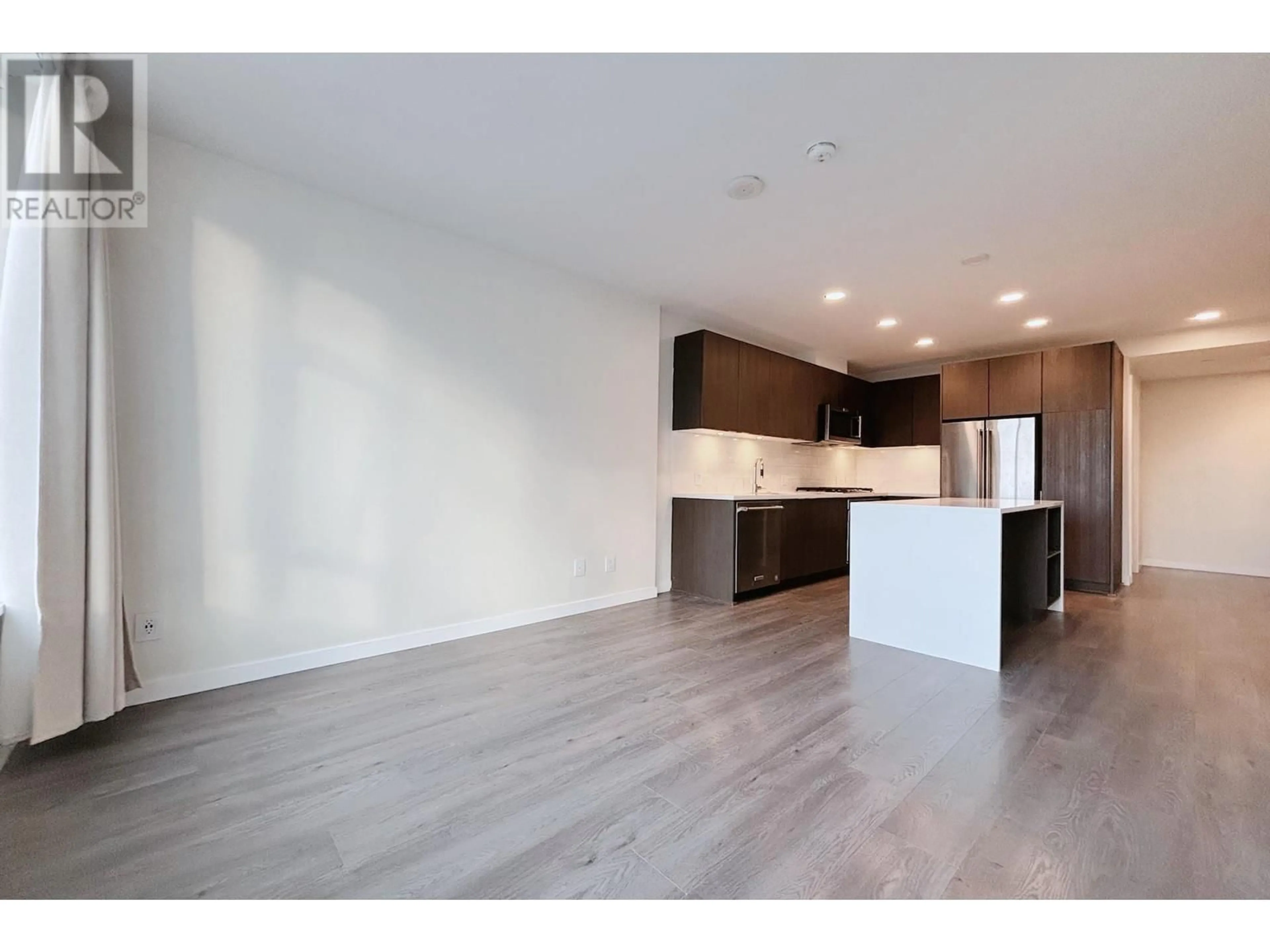 Open concept kitchen, wood/laminate floor for 2509 530 WHITING WAY, Coquitlam British Columbia V3J0J4