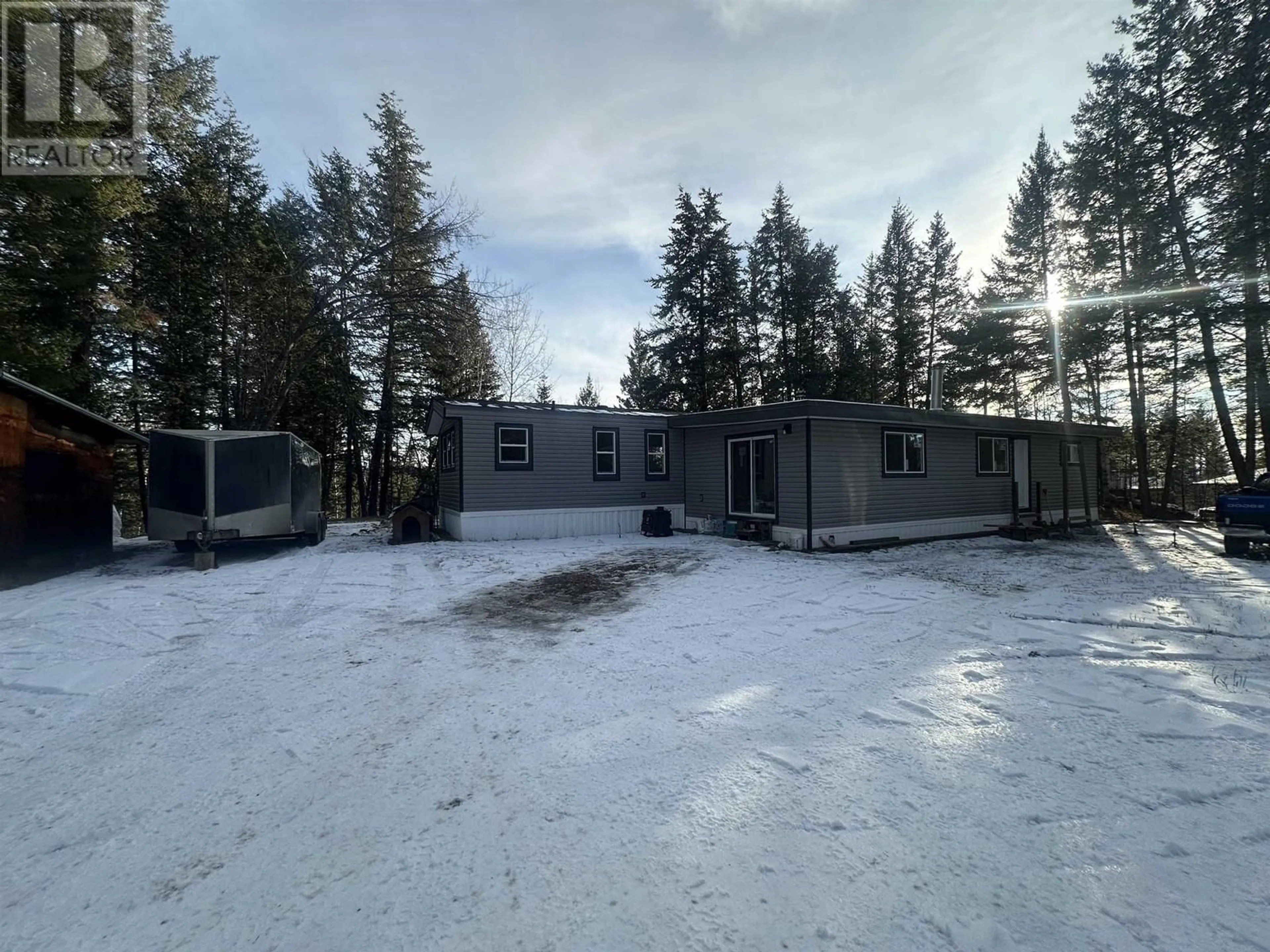 A pic from outside/outdoor area/front of a property/back of a property/a pic from drone, unknown for 3092 FERGUSON ROAD, 150 Mile House British Columbia V0K2G0