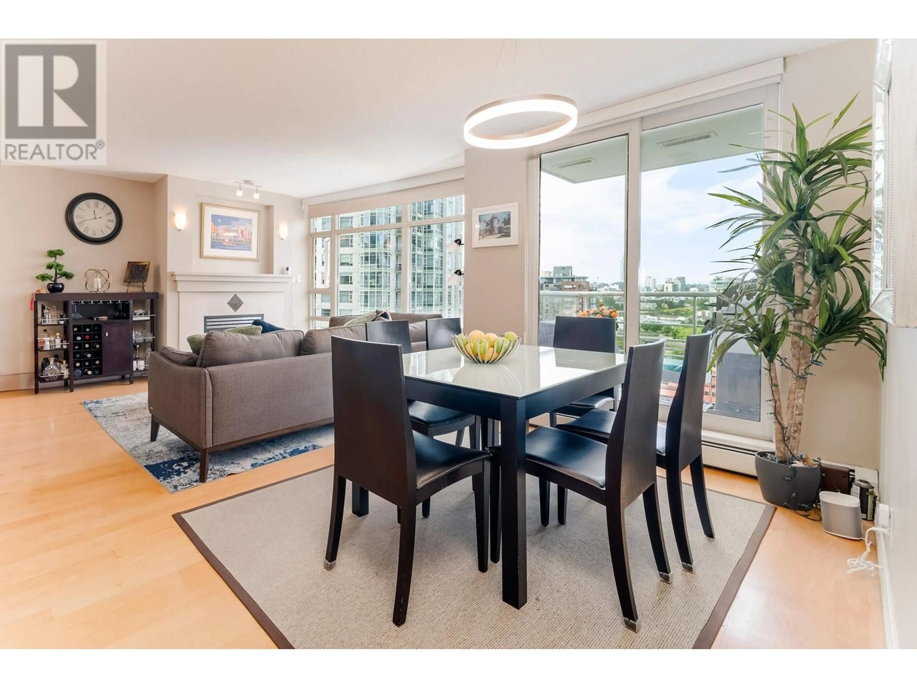 Dining room, wood/laminate floor for 1908 198 AQUARIUS MEWS, Vancouver British Columbia V6Z2Y4