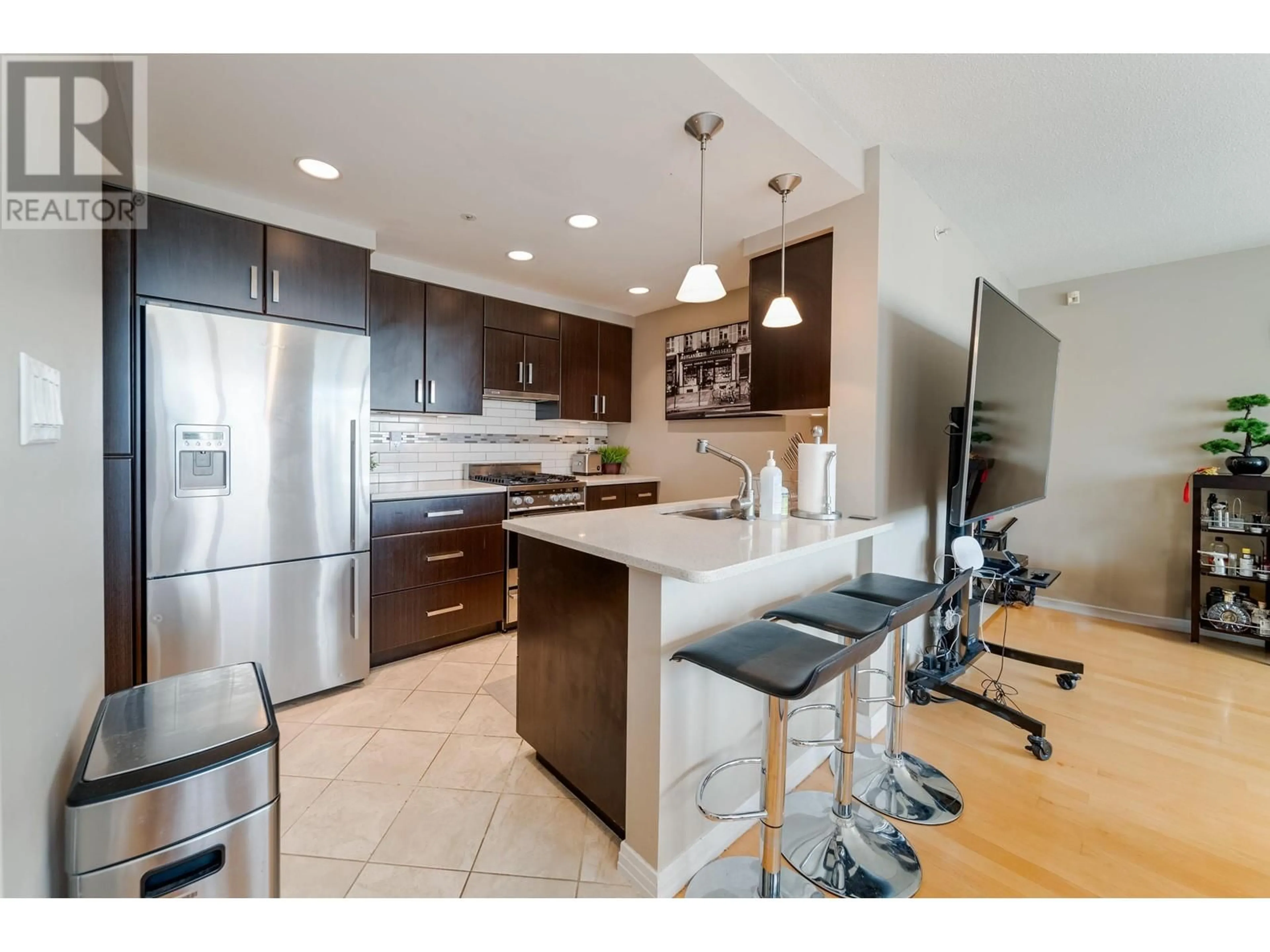 Open concept kitchen, ceramic/tile floor for 1908 198 AQUARIUS MEWS, Vancouver British Columbia V6Z2Y4