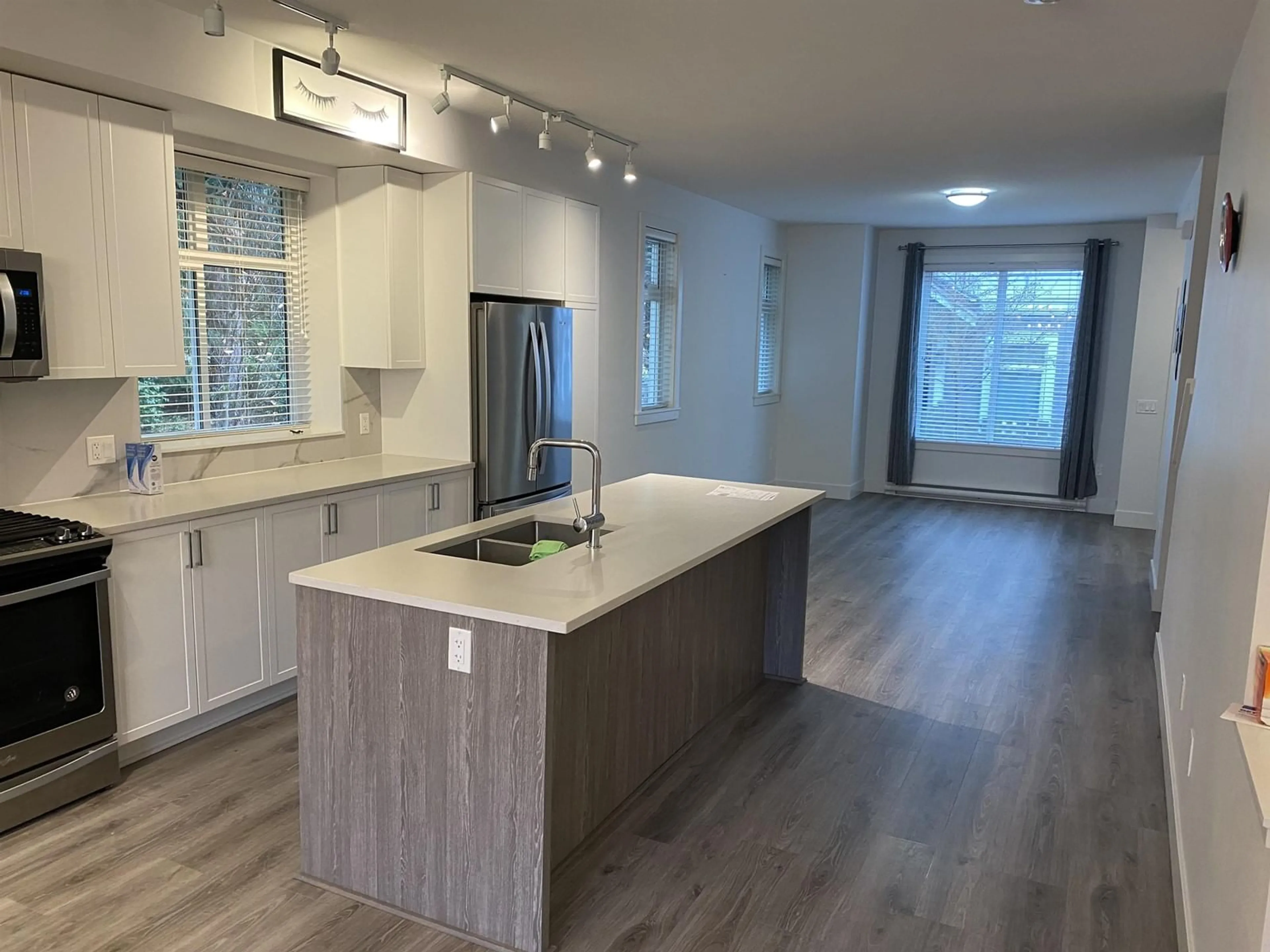 Open concept kitchen, wood/laminate floor for 49 9718 161A STREET, Surrey British Columbia V4N6S7