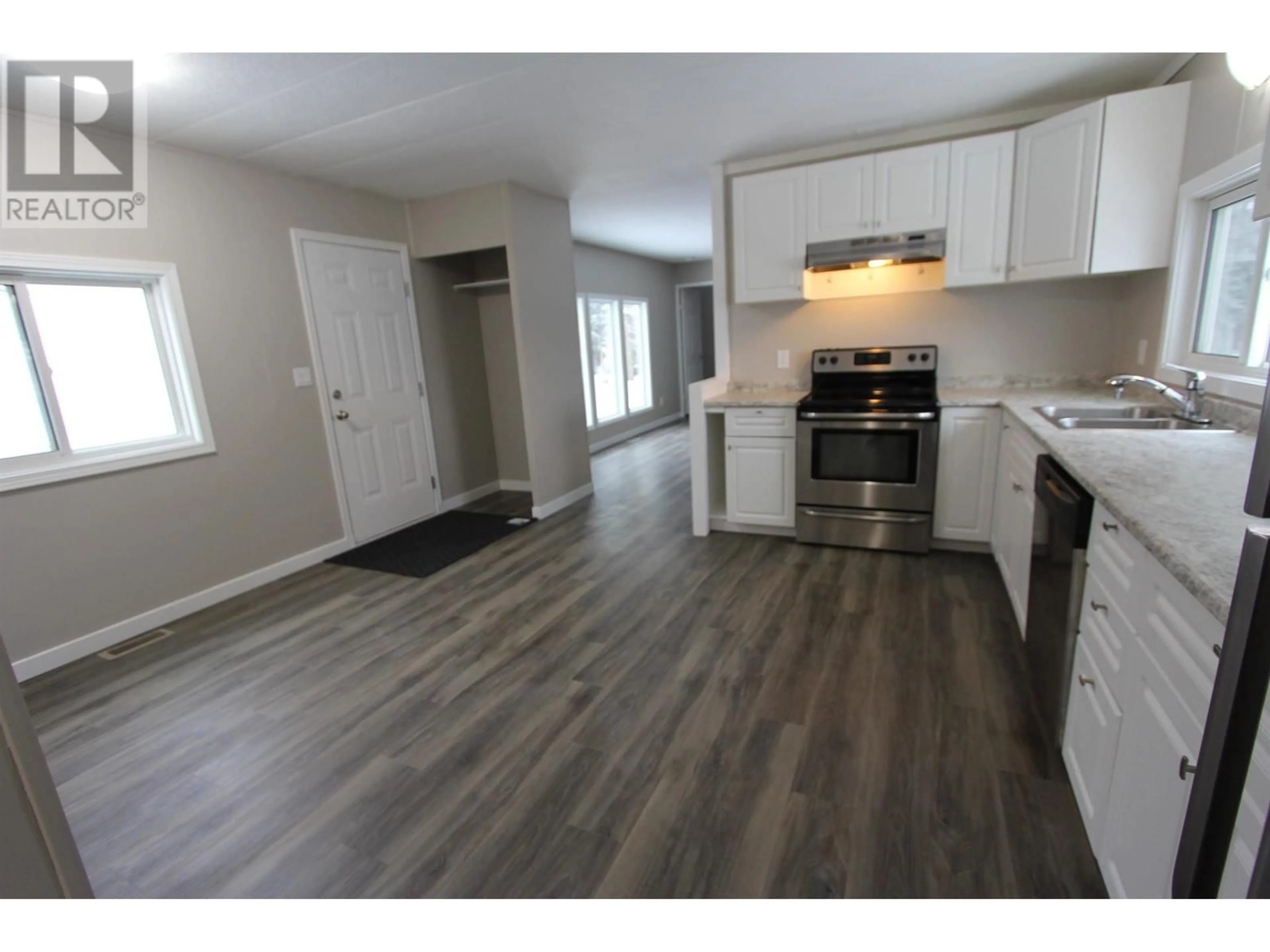 Open concept kitchen, wood/laminate floor for 6 7170 HART HIGHWAY, Prince George British Columbia V2K3A8