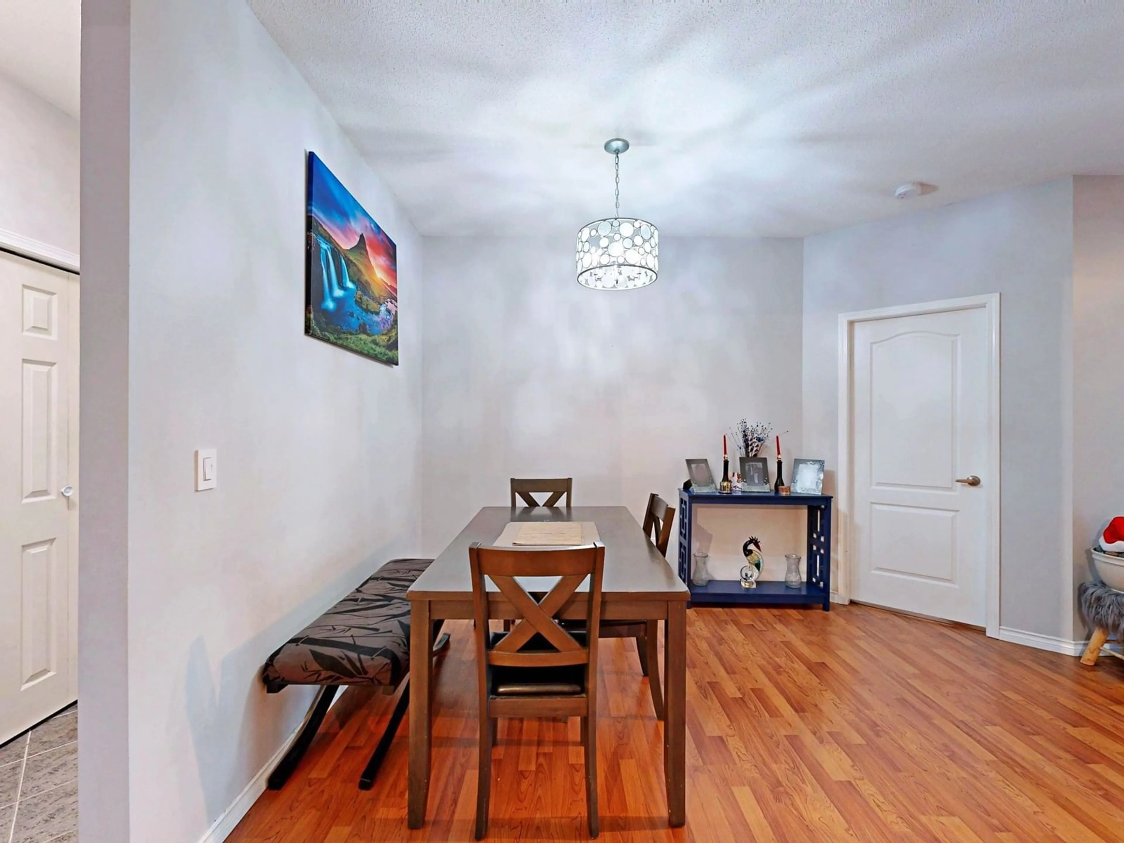 Dining room, wood/laminate floor for 110 20897 57 AVENUE, Langley British Columbia V3A8L5