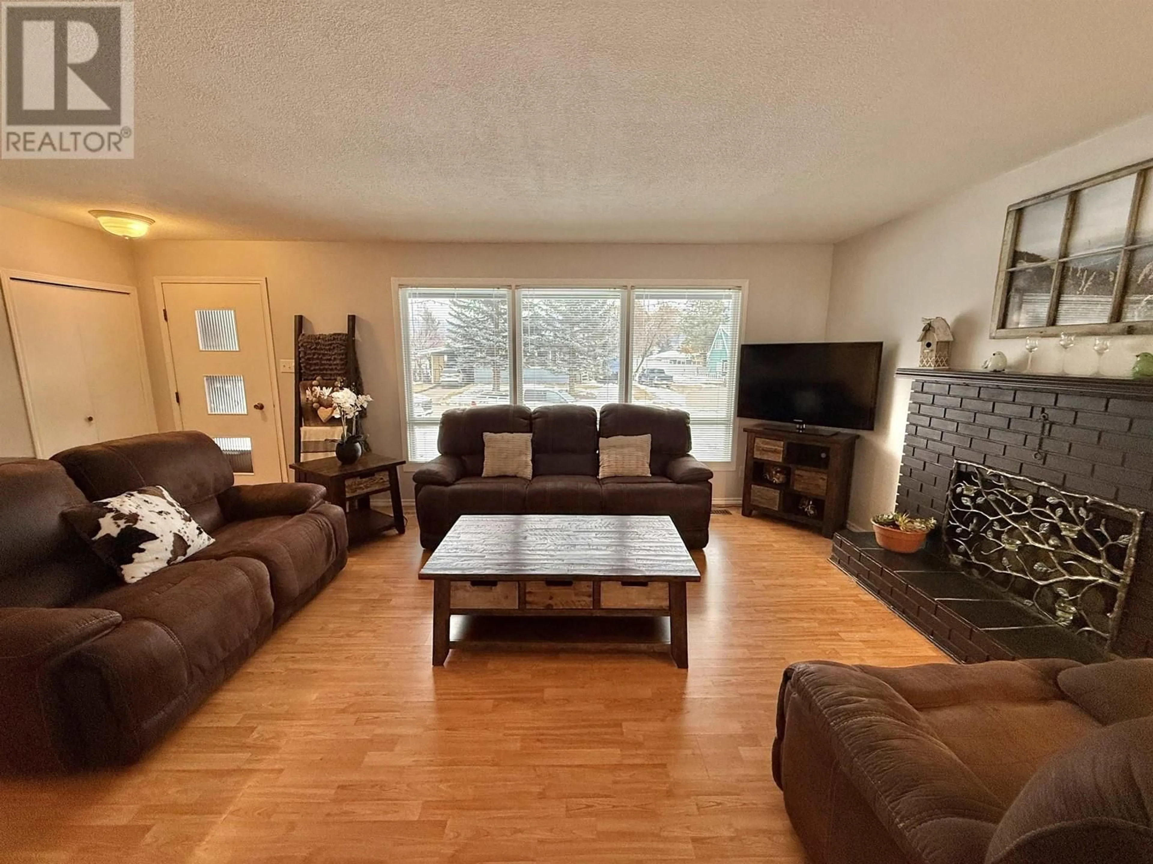 Living room with furniture, unknown for 239 LAZZARIN STREET, Quesnel British Columbia V2J3H1