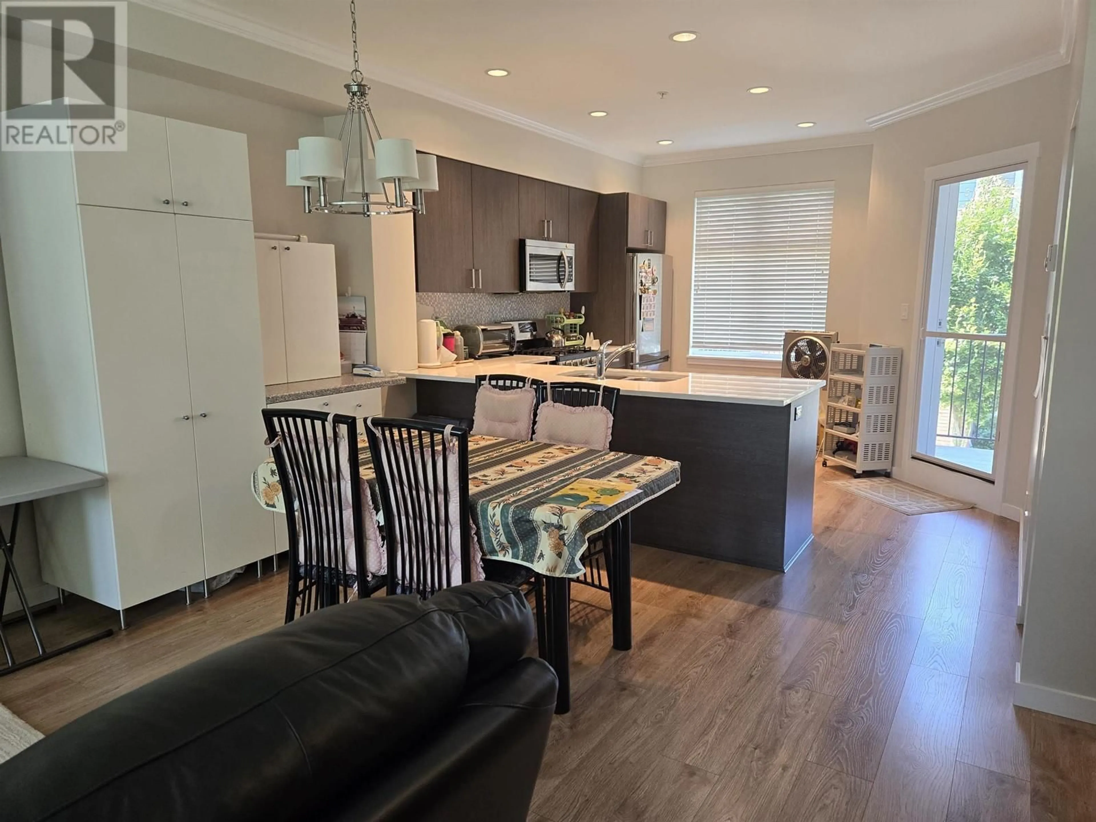 Open concept kitchen, wood/laminate floor for 10 1135 EWEN AVENUE, New Westminster British Columbia V3M5E3