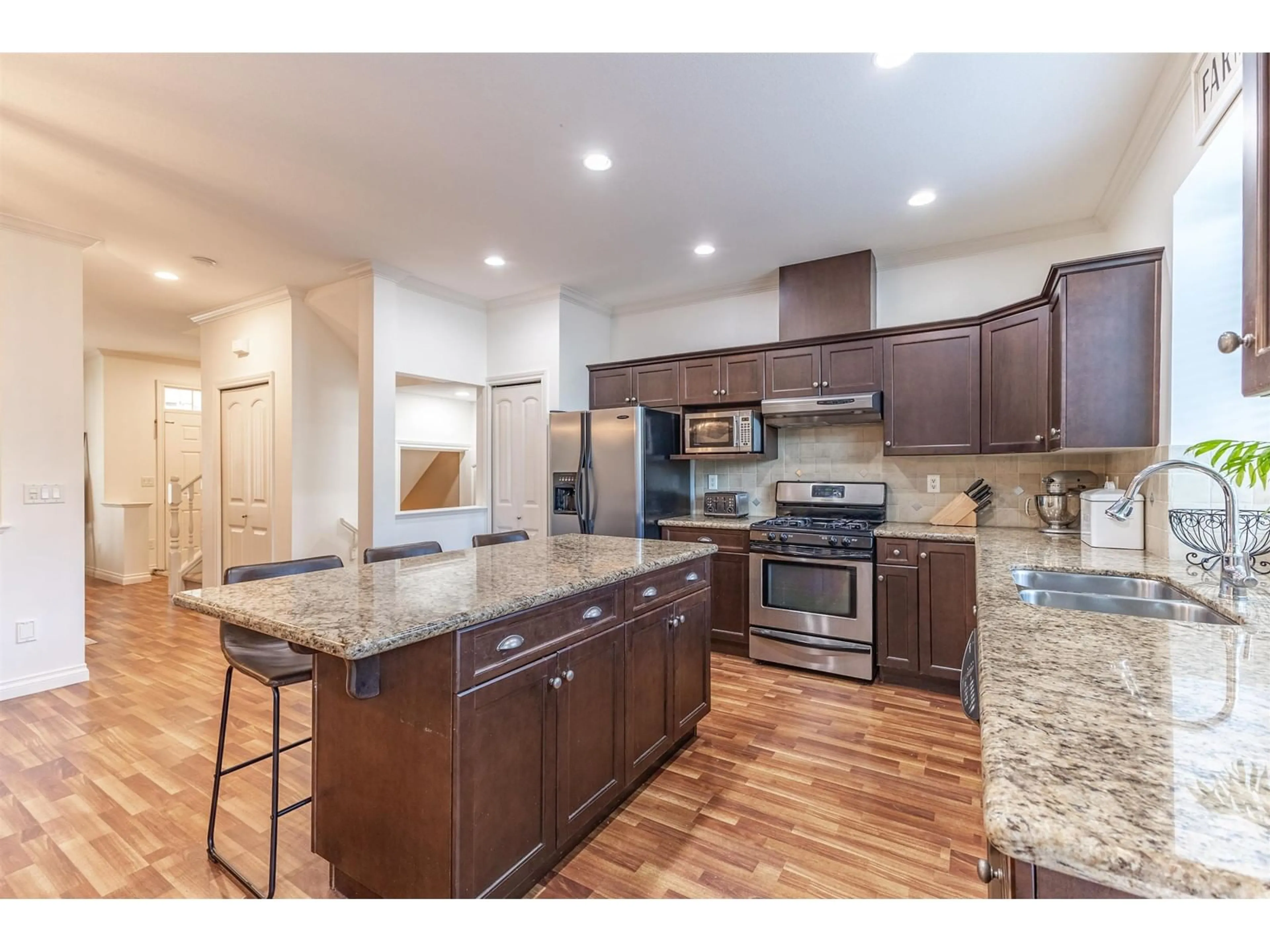 Open concept kitchen, unknown for 7013 179A STREET, Surrey British Columbia V3S7S4