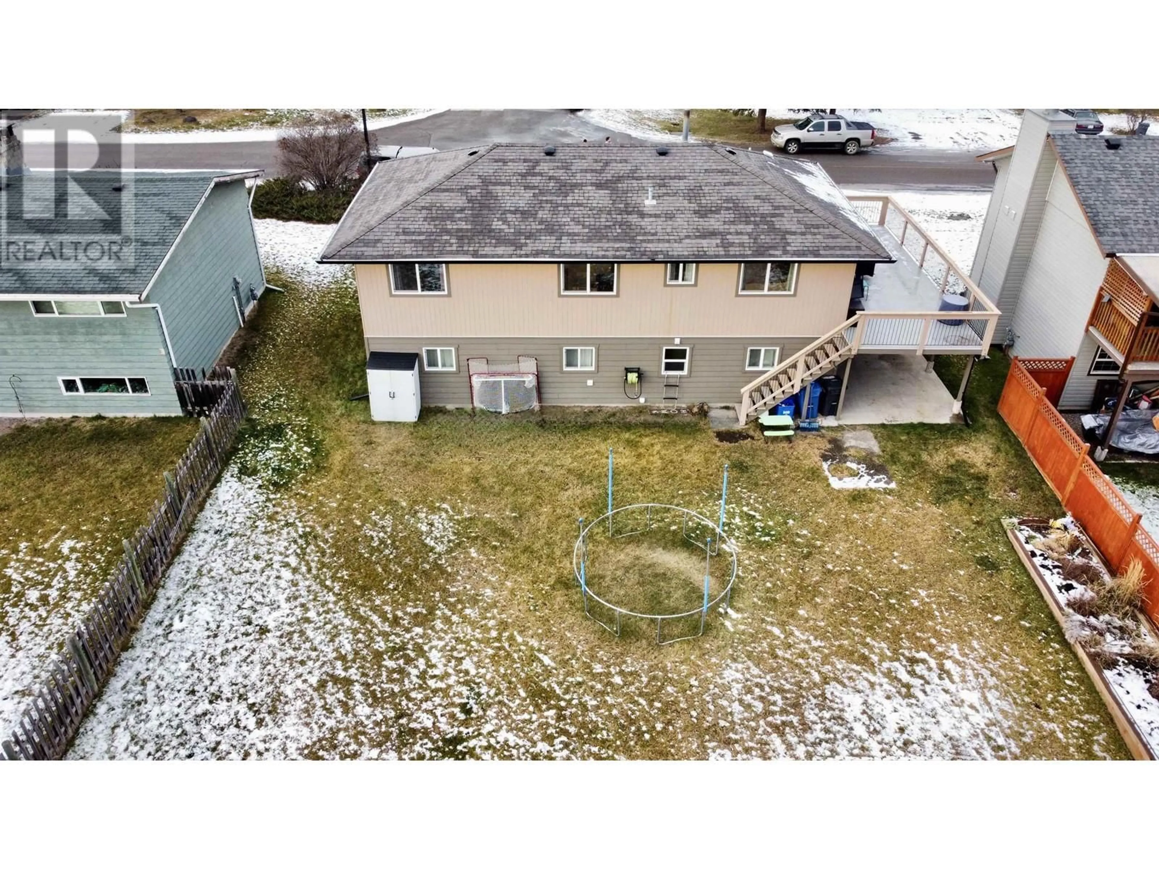 A pic from outside/outdoor area/front of a property/back of a property/a pic from drone, building for 261 ELM AVENUE, 100 Mile House British Columbia V0K2E0