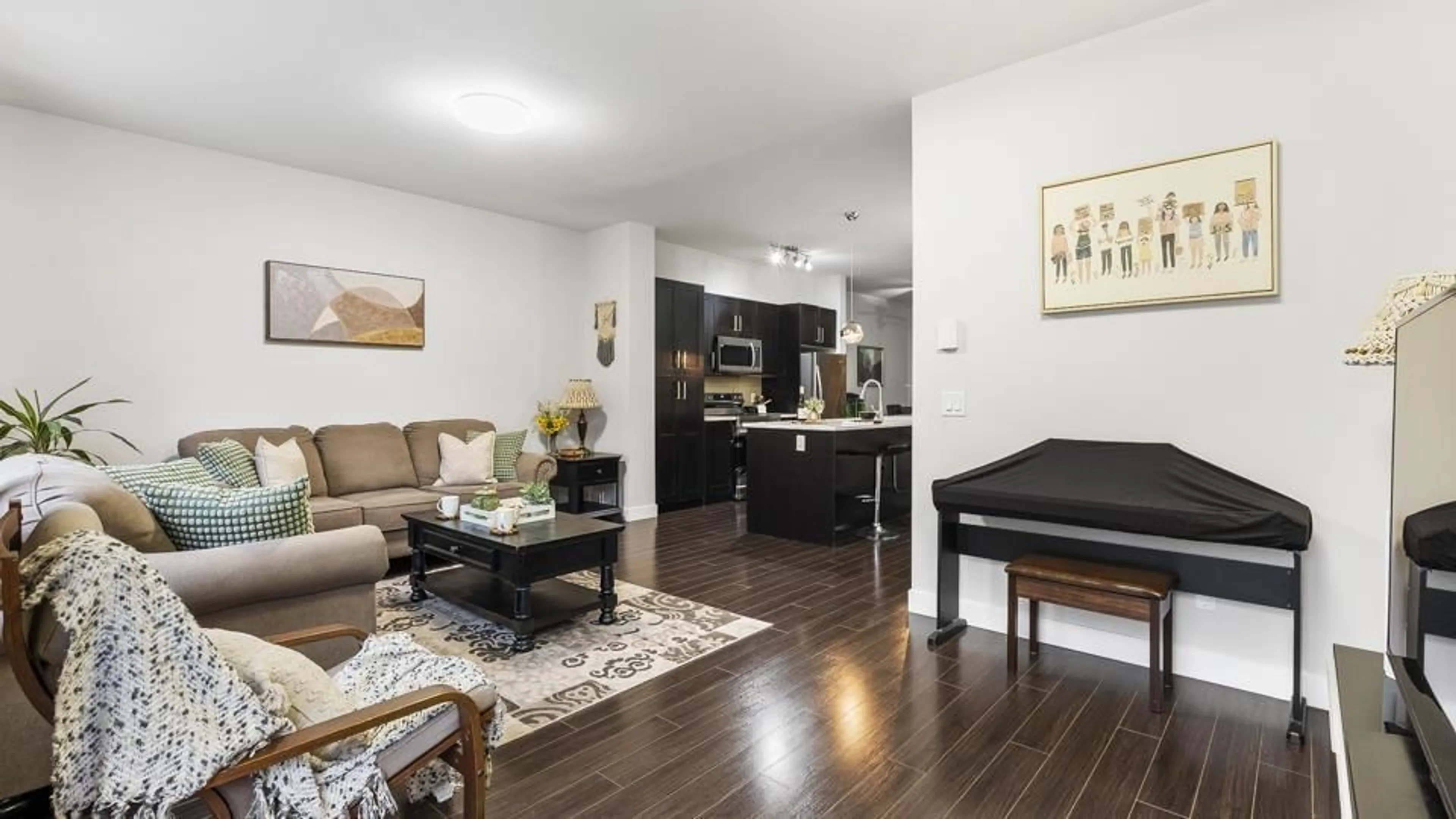 Living room with furniture, wood/laminate floor for 33 13864 HYLAND ROAD, Surrey British Columbia V3W2C3