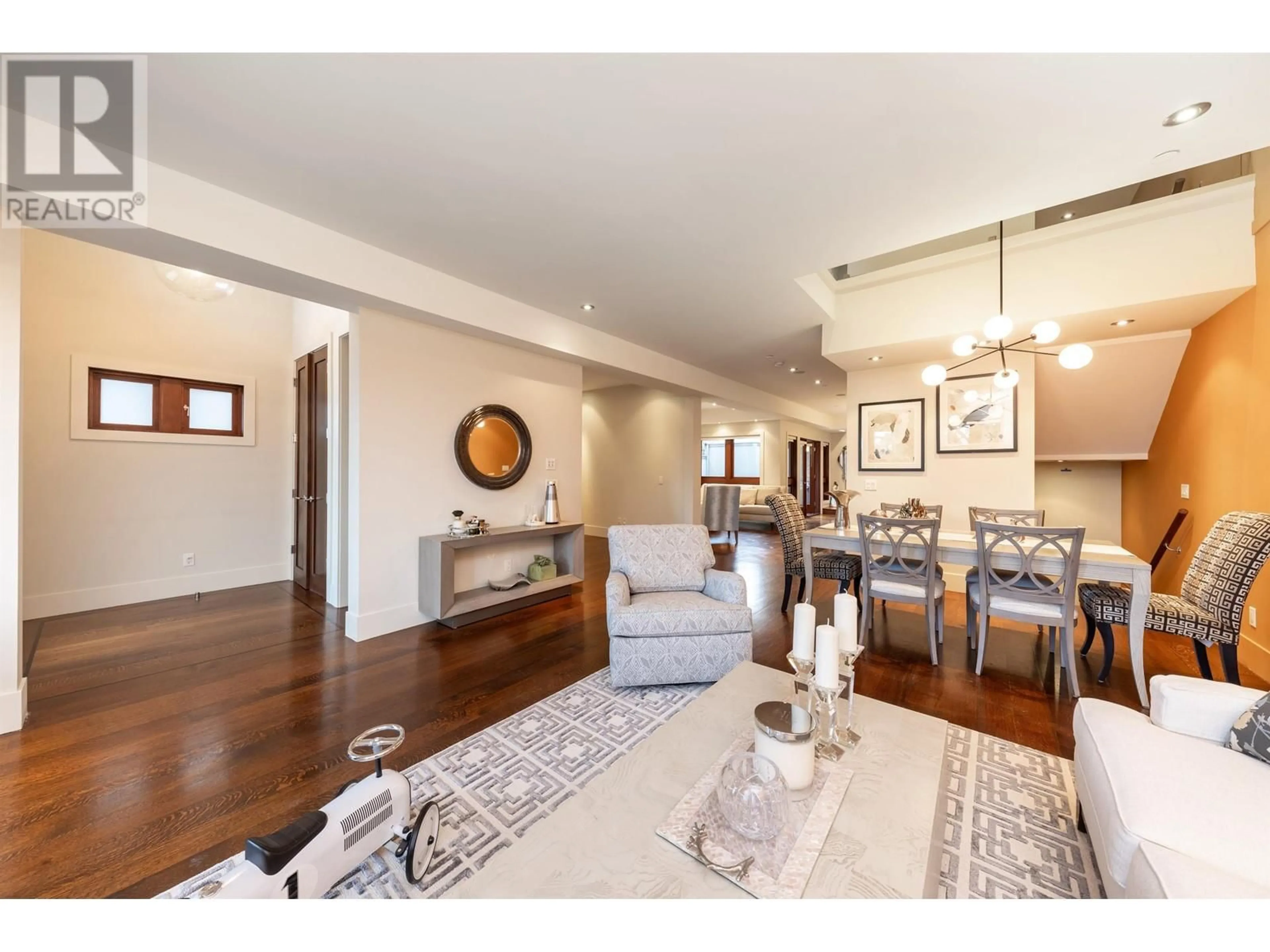 Living room with furniture, wood/laminate floor for 5922 CHANCELLOR BOULEVARD, Vancouver British Columbia V6T0A1