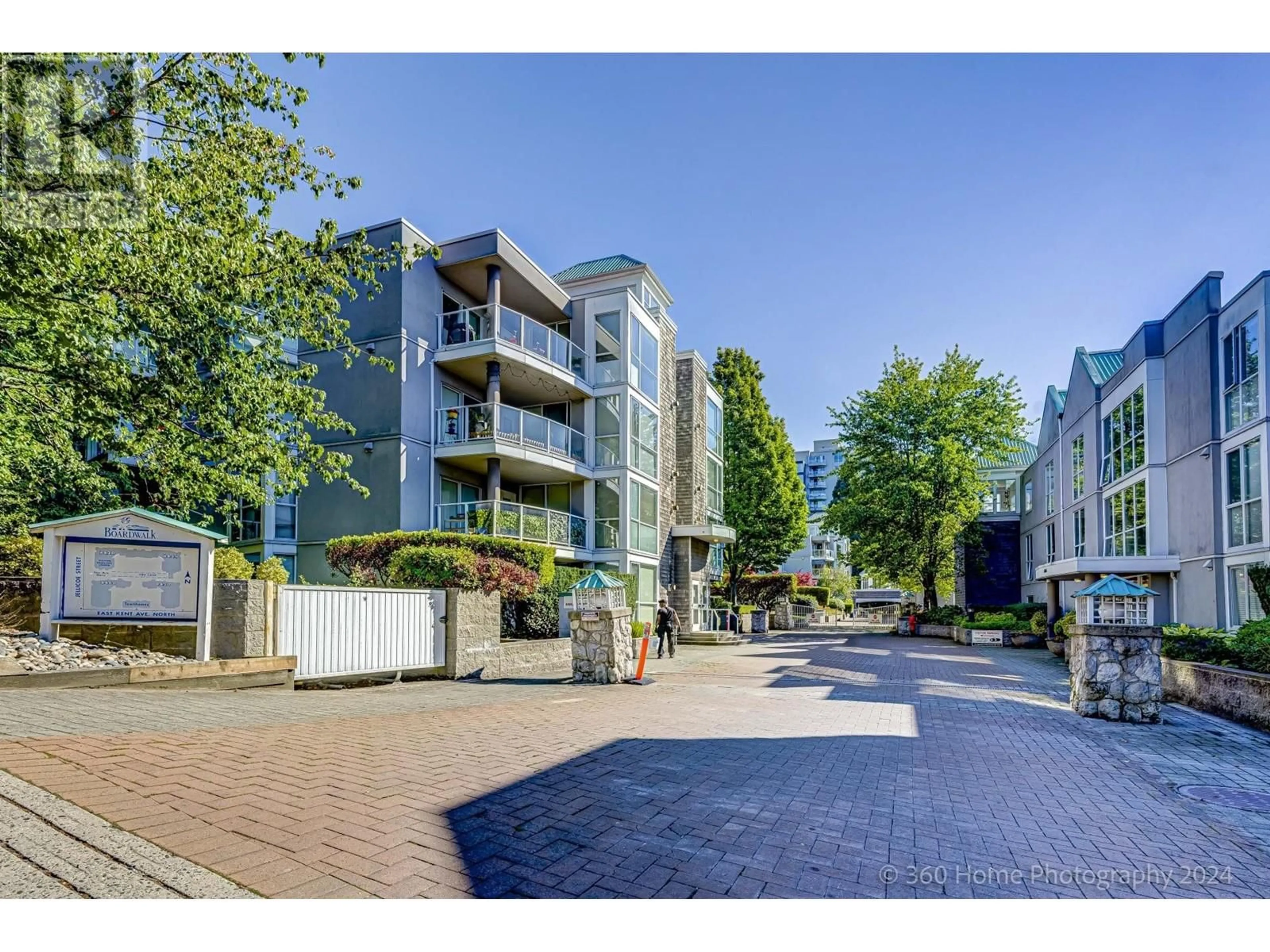 A pic from outside/outdoor area/front of a property/back of a property/a pic from drone, street for 108 8450 JELLICOE STREET, Vancouver British Columbia V5S4S9