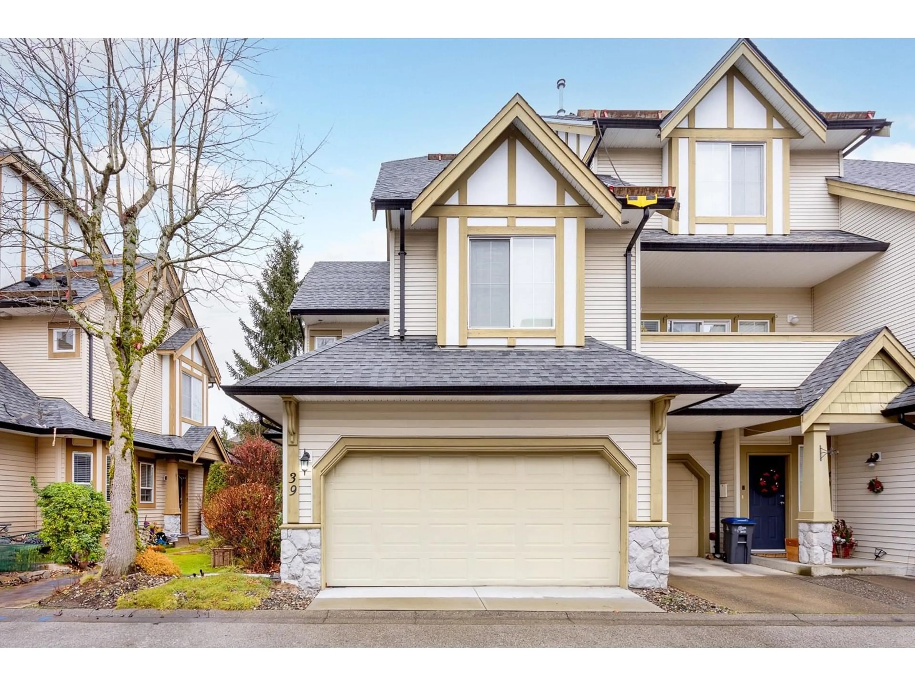 Home with vinyl exterior material, street for 39 18707 65 AVENUE, Surrey British Columbia V3S9H2