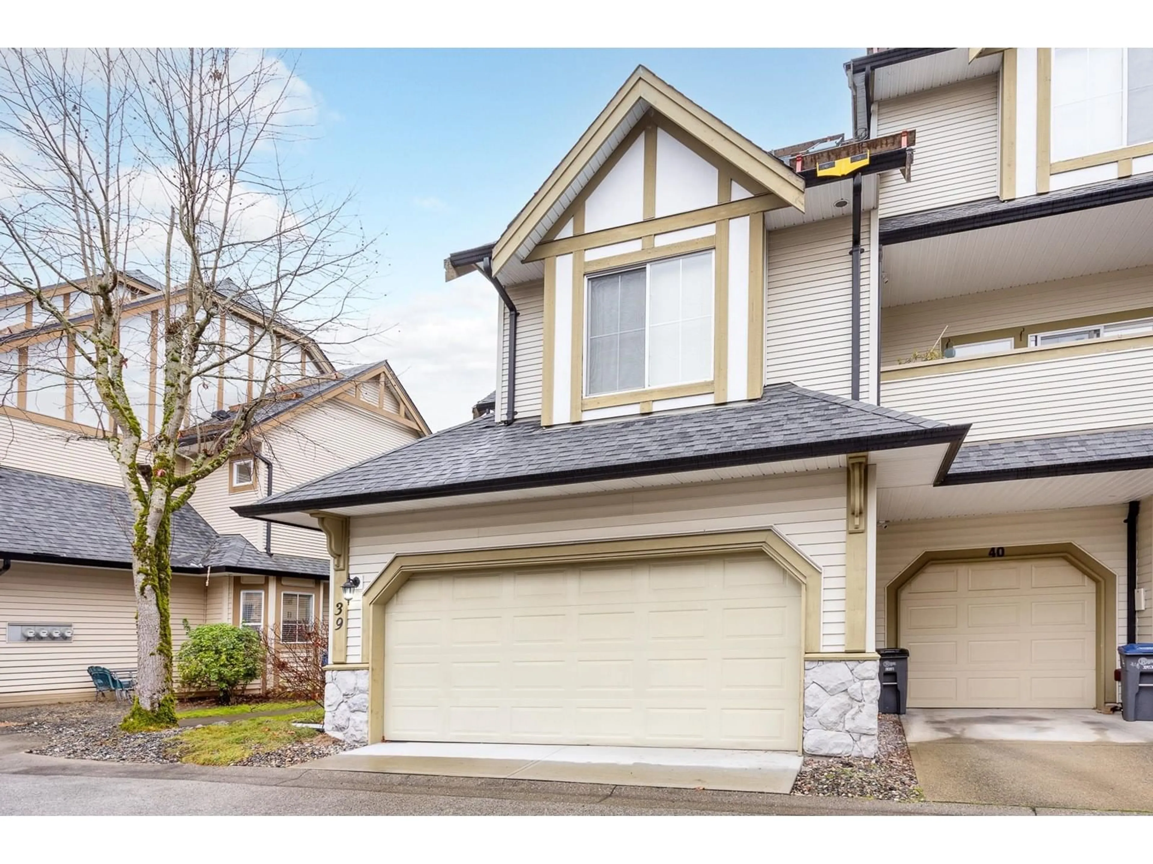 Home with vinyl exterior material, street for 39 18707 65 AVENUE, Surrey British Columbia V3S9H2