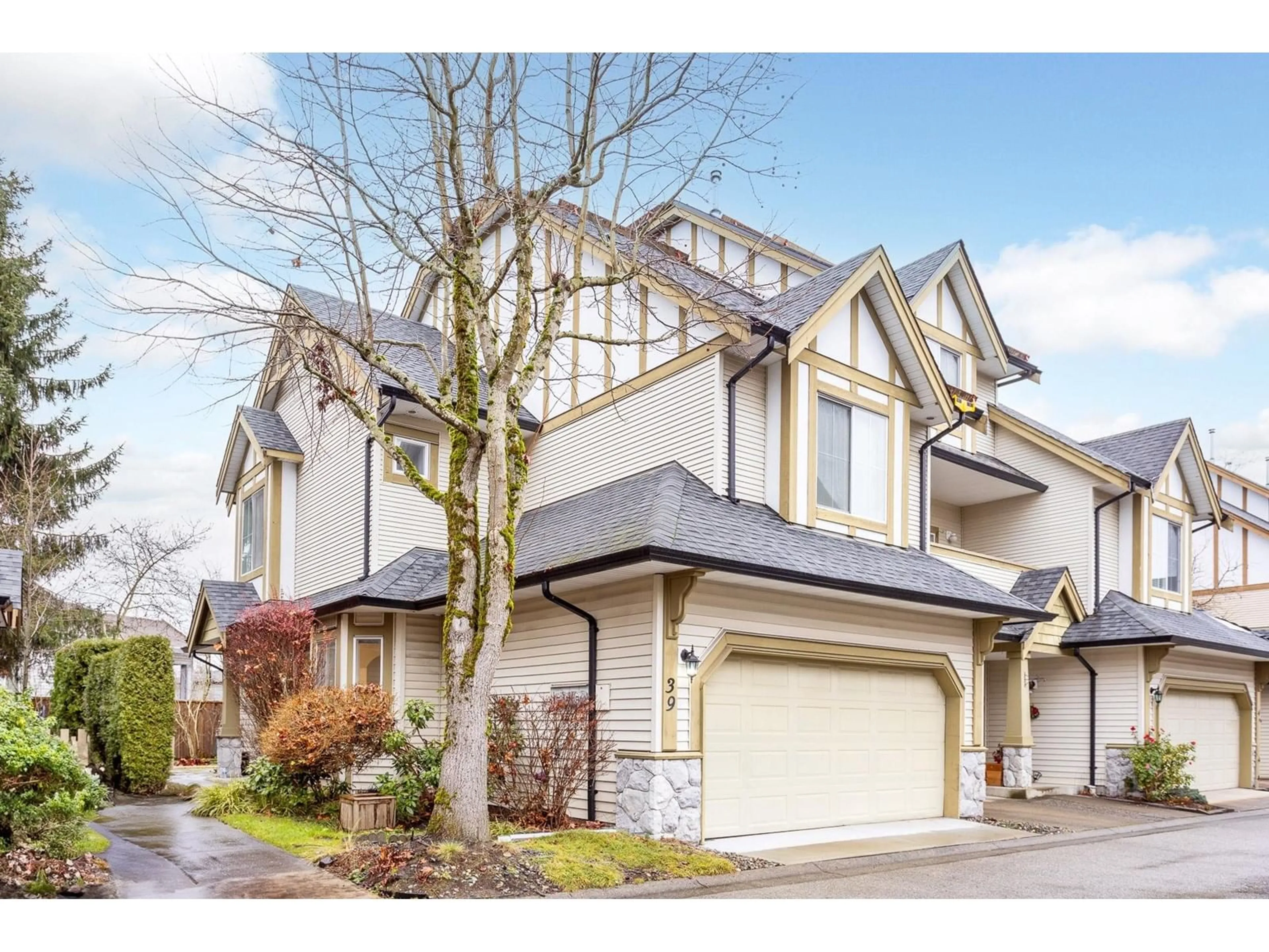 Home with vinyl exterior material, street for 39 18707 65 AVENUE, Surrey British Columbia V3S9H2