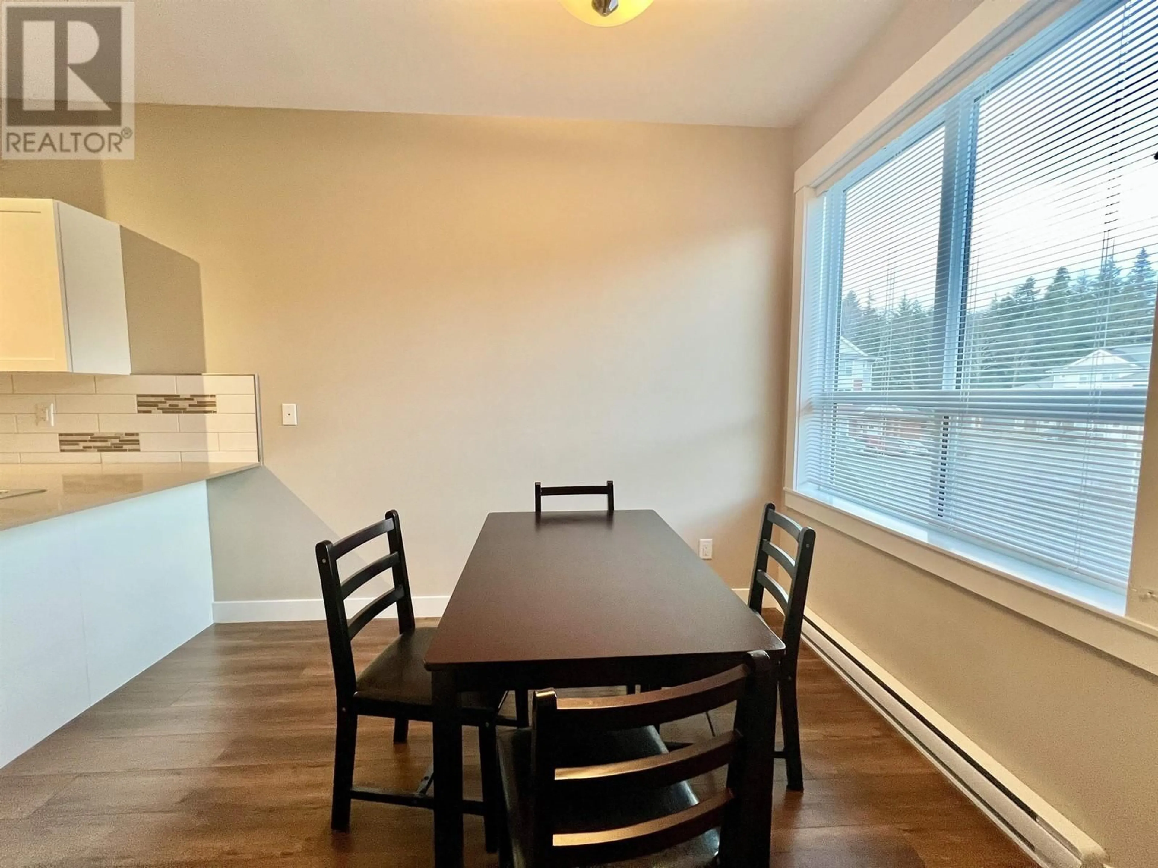 Dining room, wood/laminate floor for 107 110 BAXTER AVENUE, Kitimat British Columbia V8C2N9