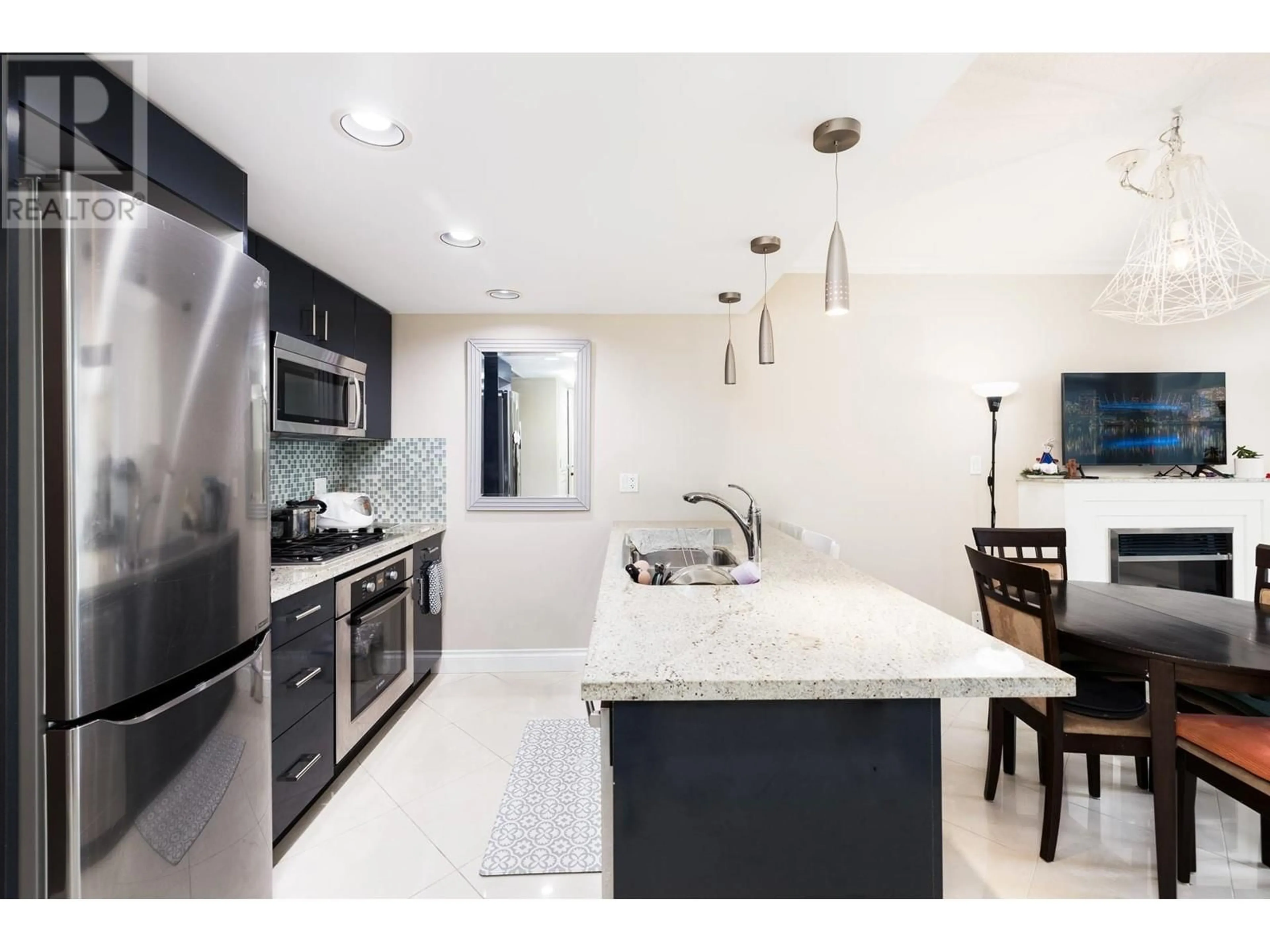 Open concept kitchen, ceramic/tile floor for 607 133 E ESPLANADE AVENUE, North Vancouver British Columbia V7L1A1