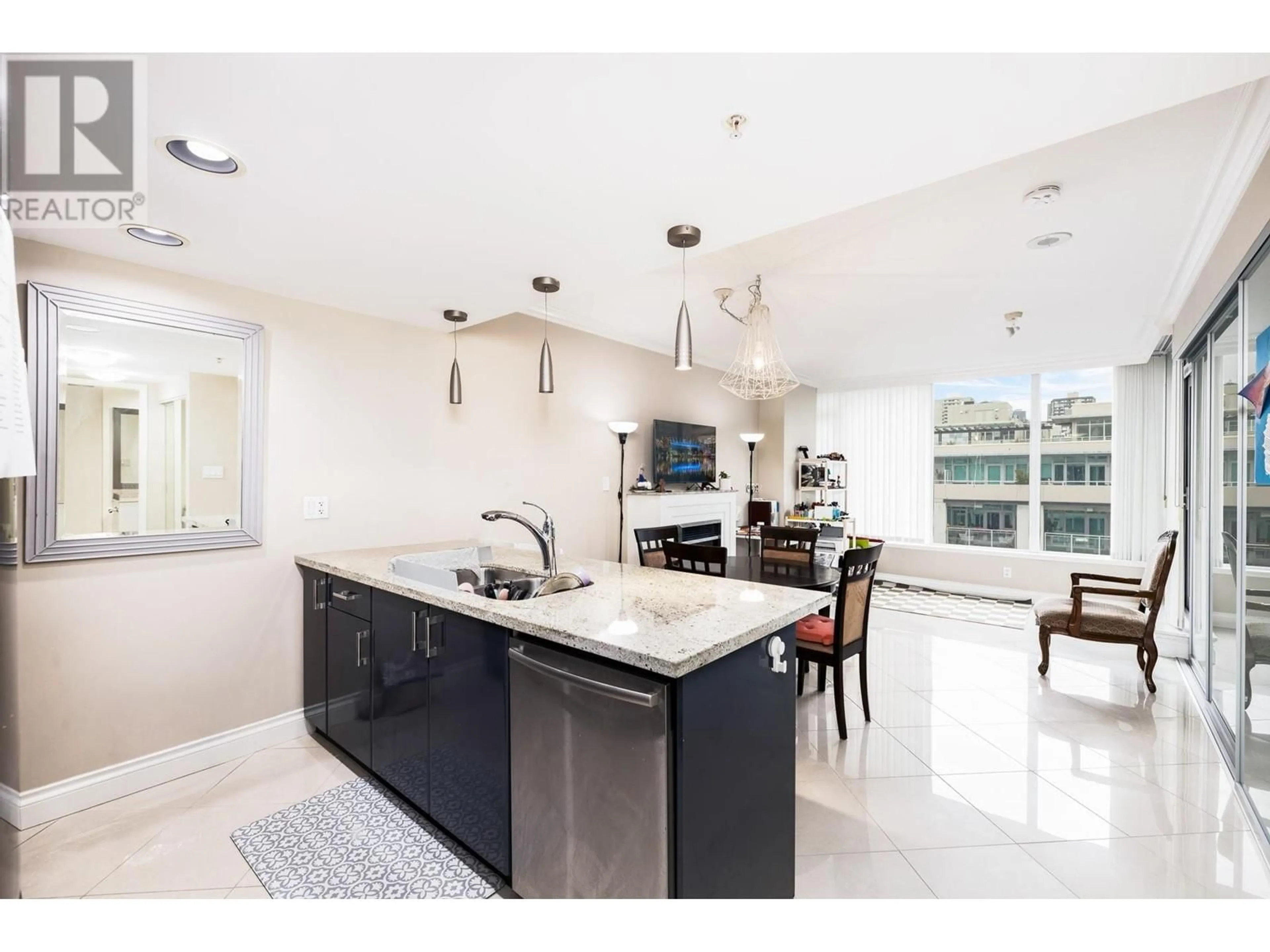 Open concept kitchen, ceramic/tile floor for 607 133 E ESPLANADE AVENUE, North Vancouver British Columbia V7L1A1