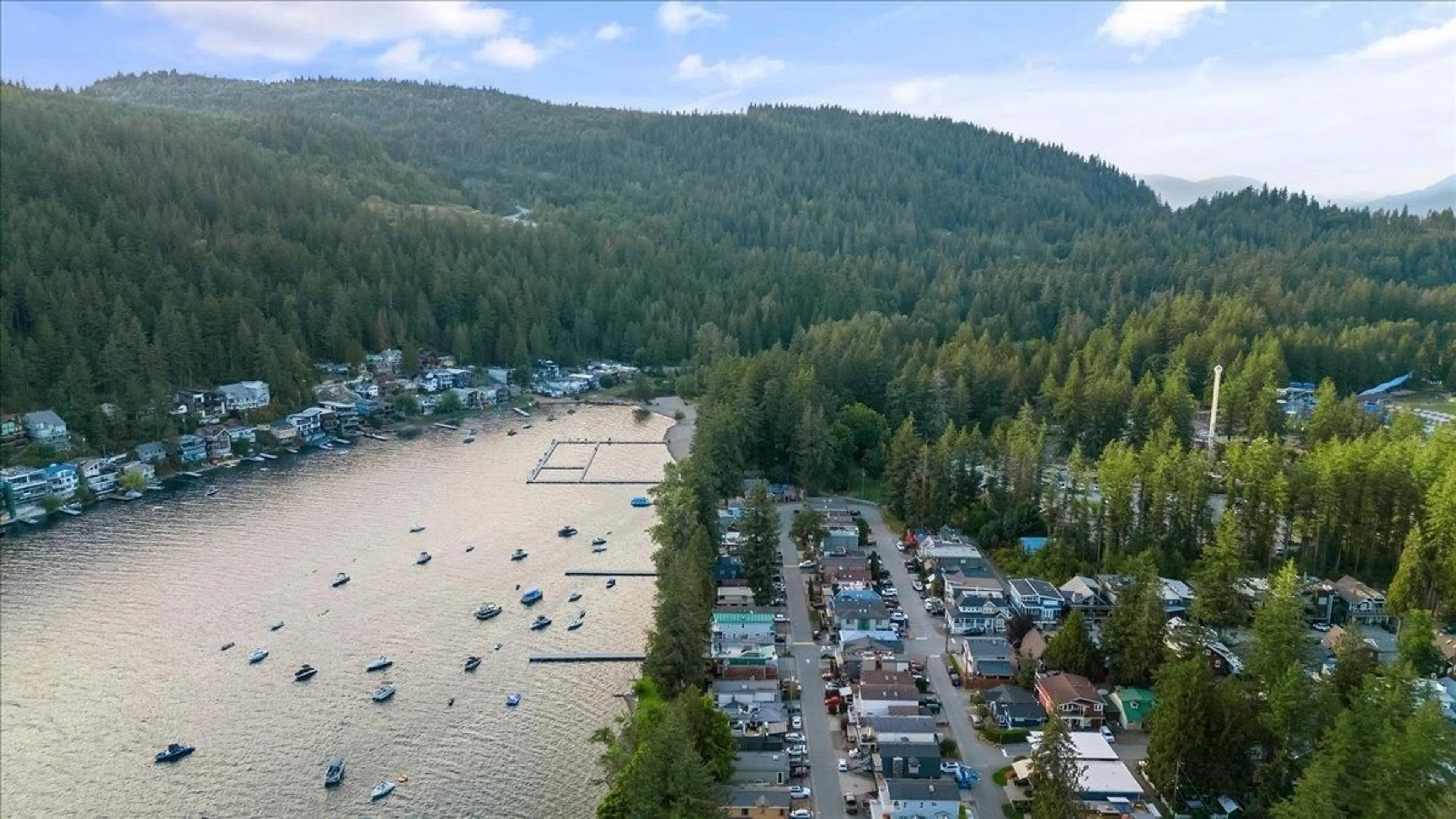 A pic from outside/outdoor area/front of a property/back of a property/a pic from drone, water/lake/river/ocean view for 253 FIRST AVENUE, Cultus Lake British Columbia V2R4Z2