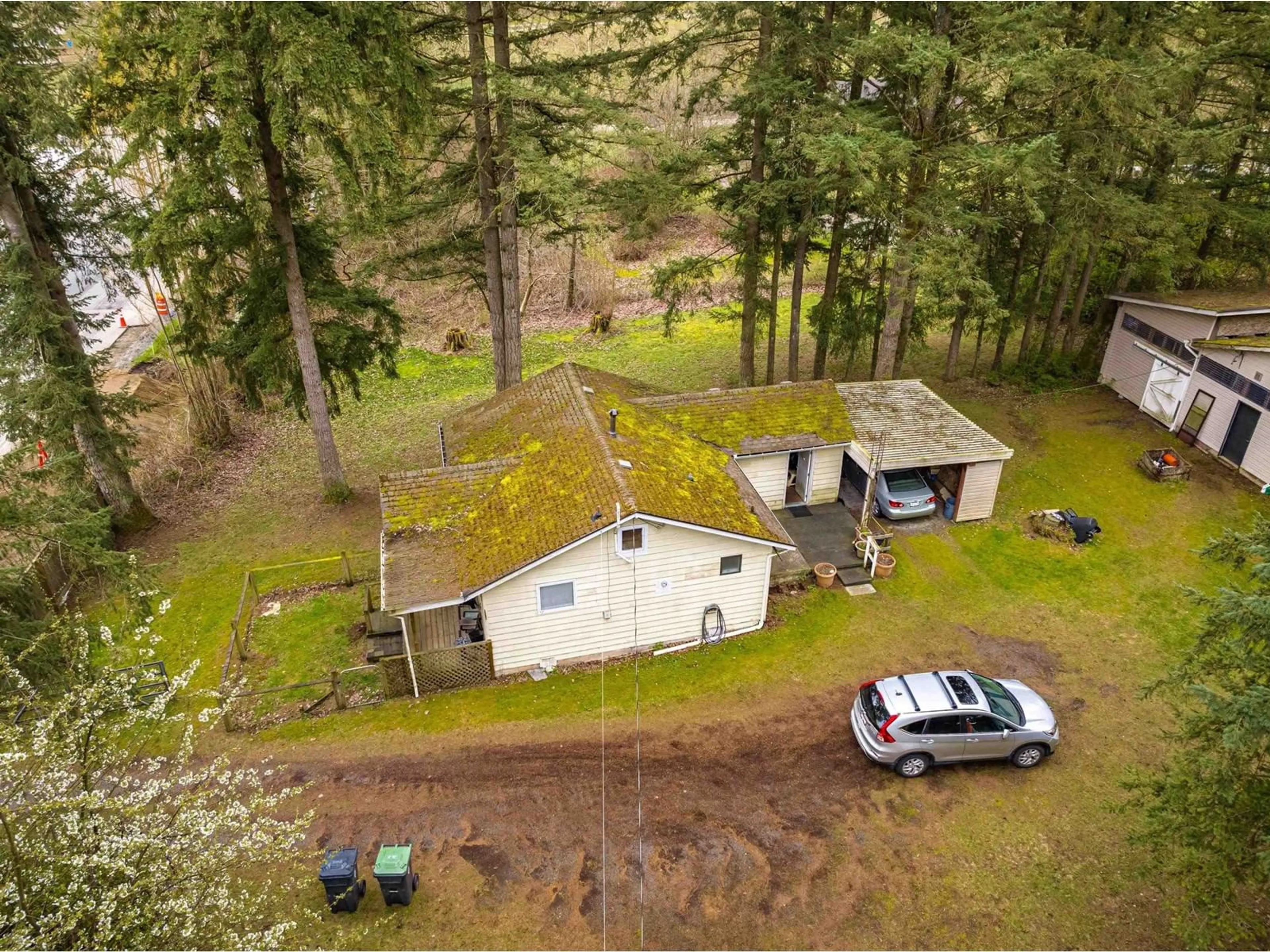 A pic from outside/outdoor area/front of a property/back of a property/a pic from drone, forest/trees view for 3381 208 STREET, Langley British Columbia V2Z2C5