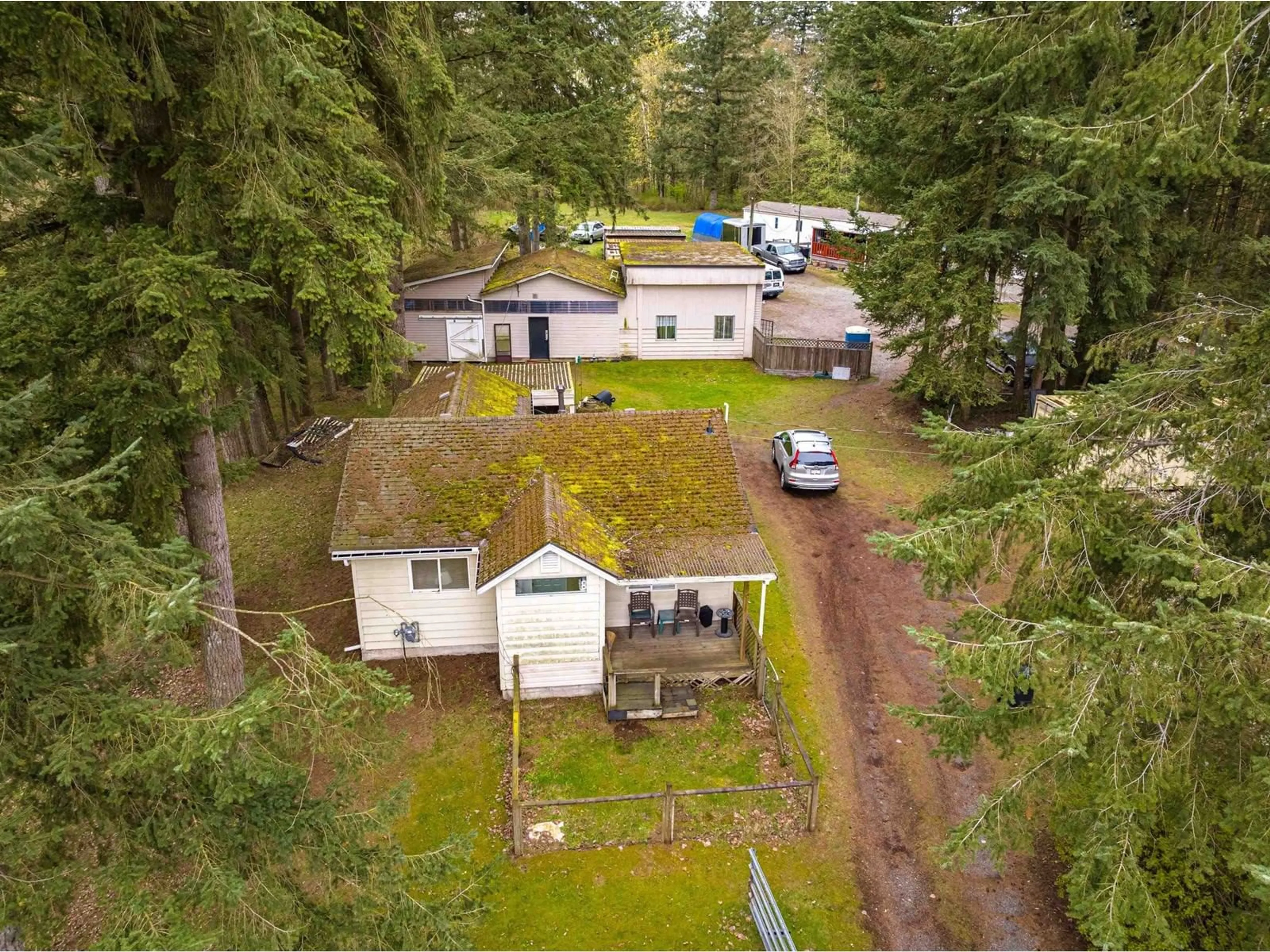 A pic from outside/outdoor area/front of a property/back of a property/a pic from drone, forest/trees view for 3381 208 STREET, Langley British Columbia V2Z2C5