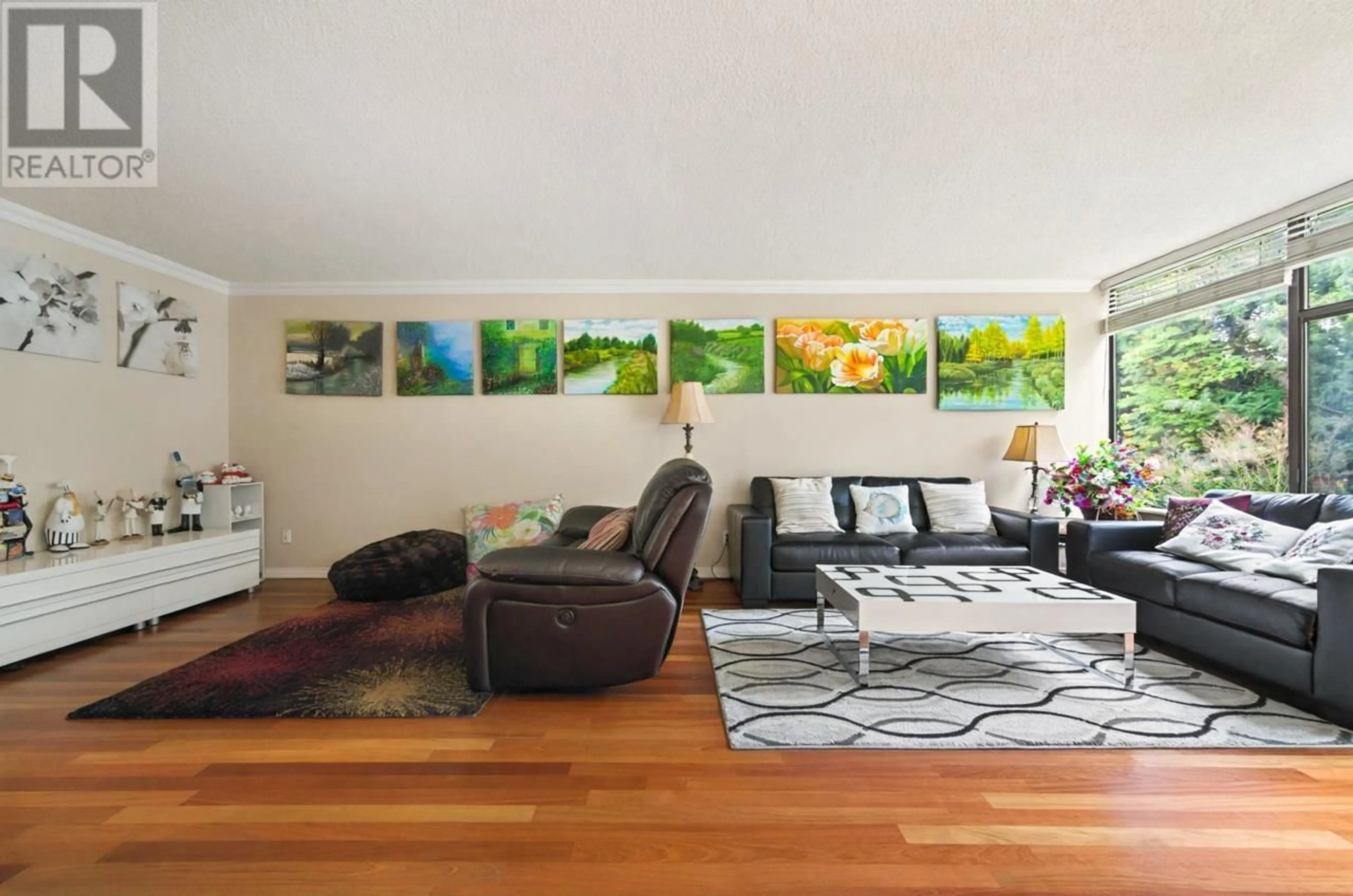 Living room with furniture, wood/laminate floor for 303 4101 YEW STREET, Vancouver British Columbia V6L3B7