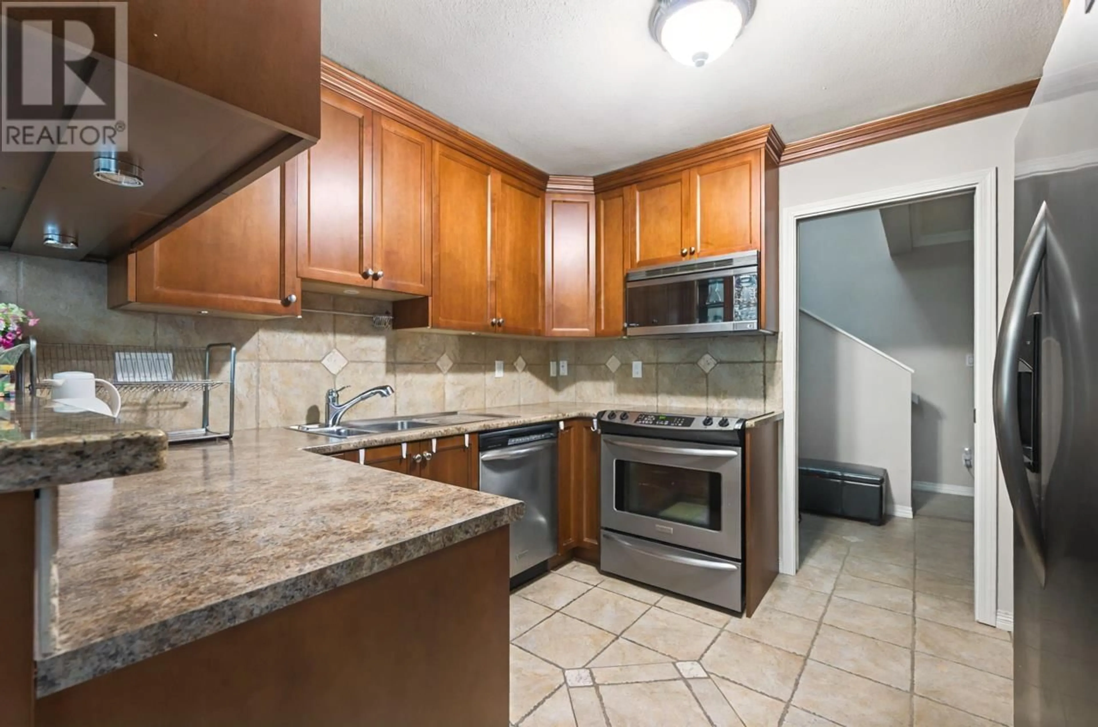 Standard kitchen, ceramic/tile floor for 303 4101 YEW STREET, Vancouver British Columbia V6L3B7