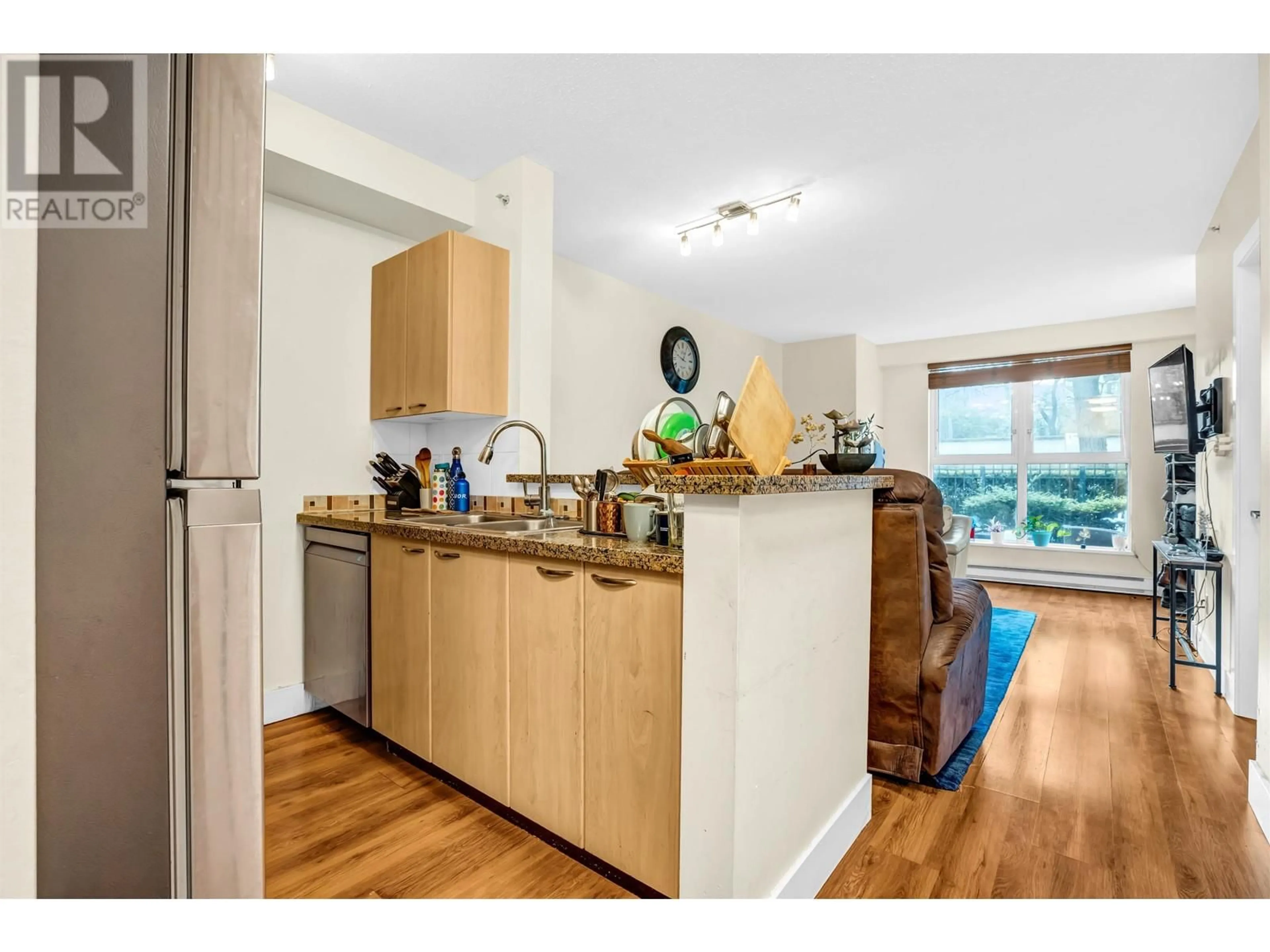 Open concept kitchen, wood/laminate floor for 1405 ALBERNI STREET, Vancouver British Columbia V6G3K6