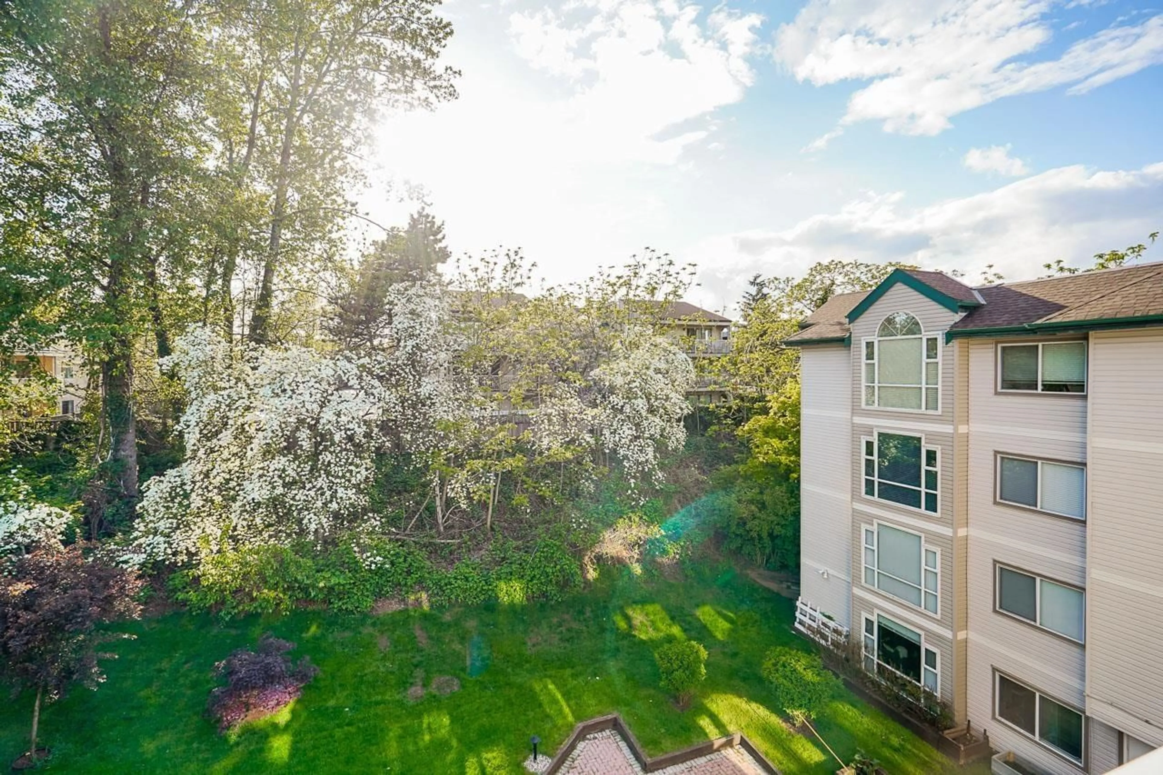 A pic from outside/outdoor area/front of a property/back of a property/a pic from drone, water/lake/river/ocean view for 405 2963 NELSON PLACE, Abbotsford British Columbia V2S7L6