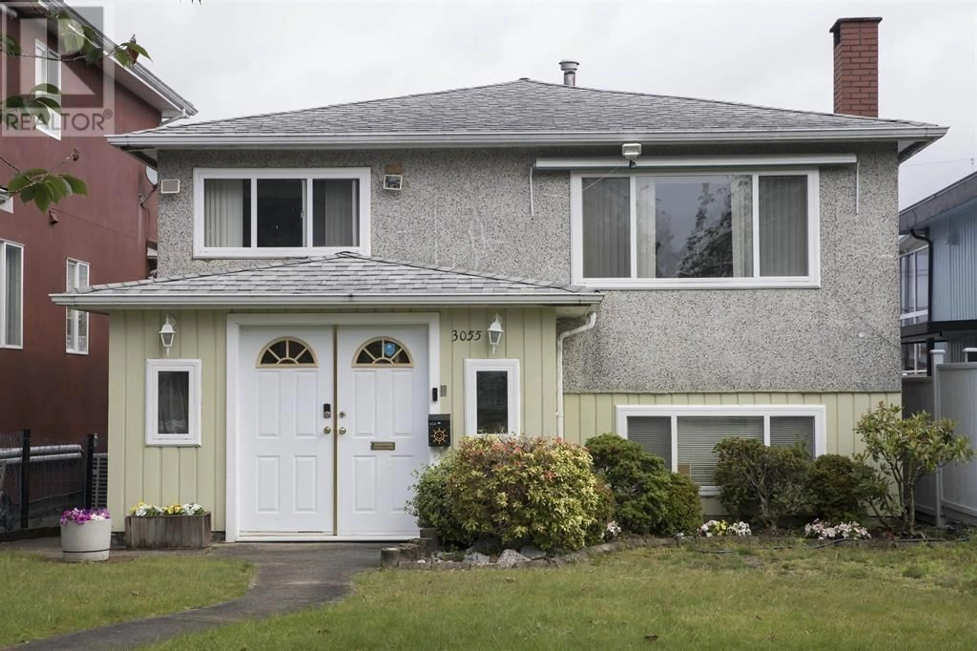 Home with vinyl exterior material, street for 3055 E 24TH AVENUE, Vancouver British Columbia V5R1E7