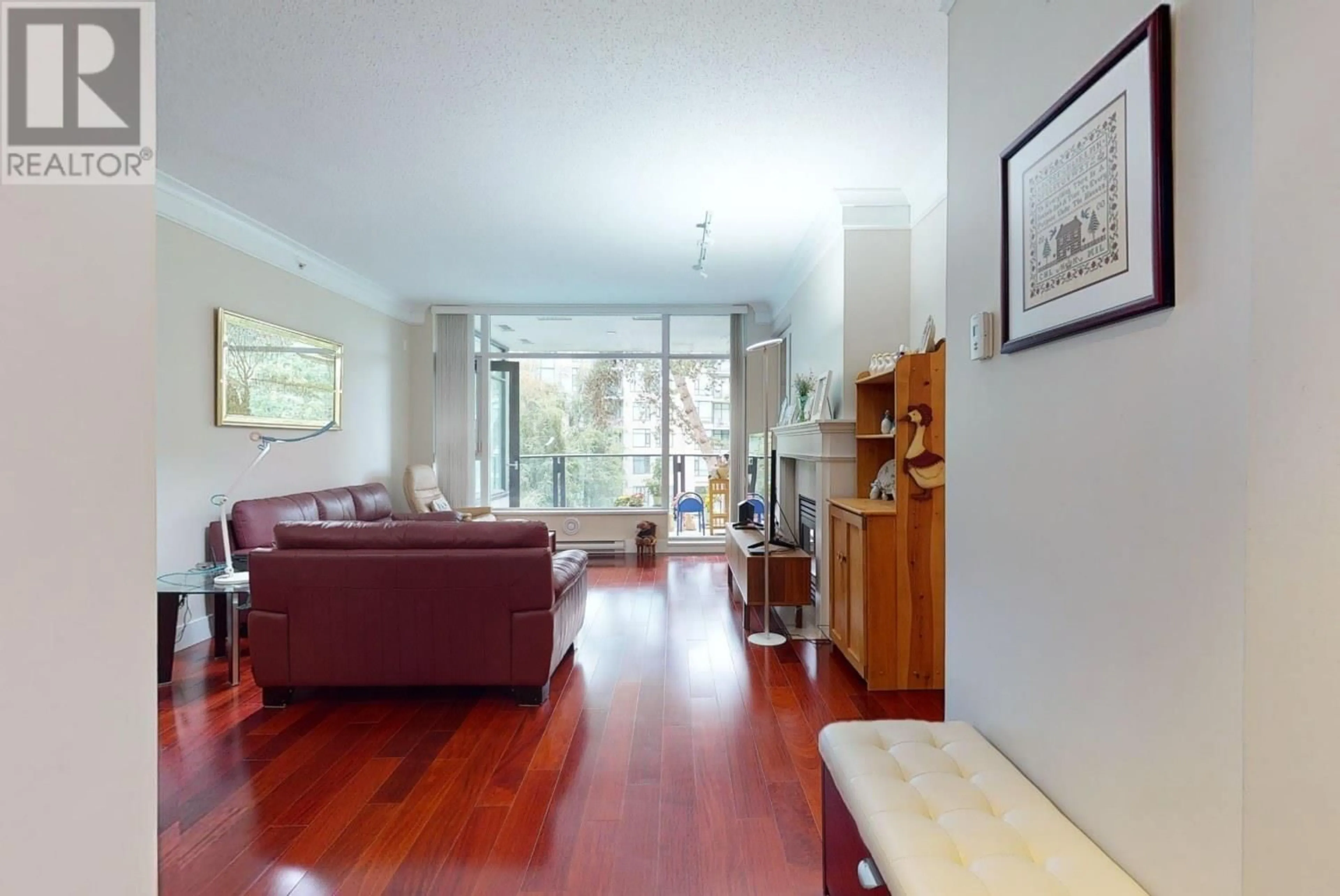 Living room with furniture, wood/laminate floor for 306 4759 VALLEY DRIVE, Vancouver British Columbia V6J4B7