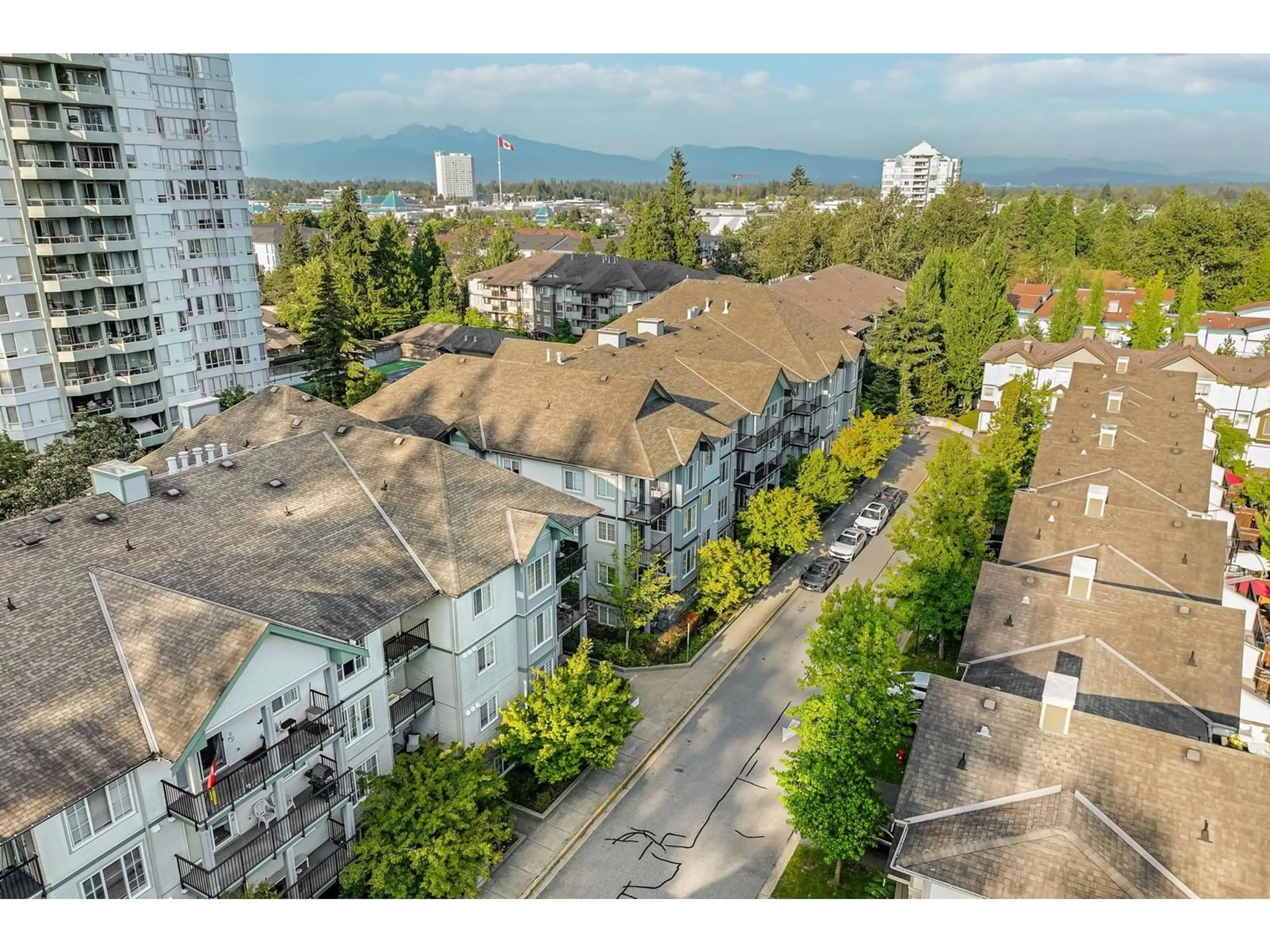 A pic from outside/outdoor area/front of a property/back of a property/a pic from drone, city buildings view from balcony for 101 14877 100 AVENUE, Surrey British Columbia V3R3H1