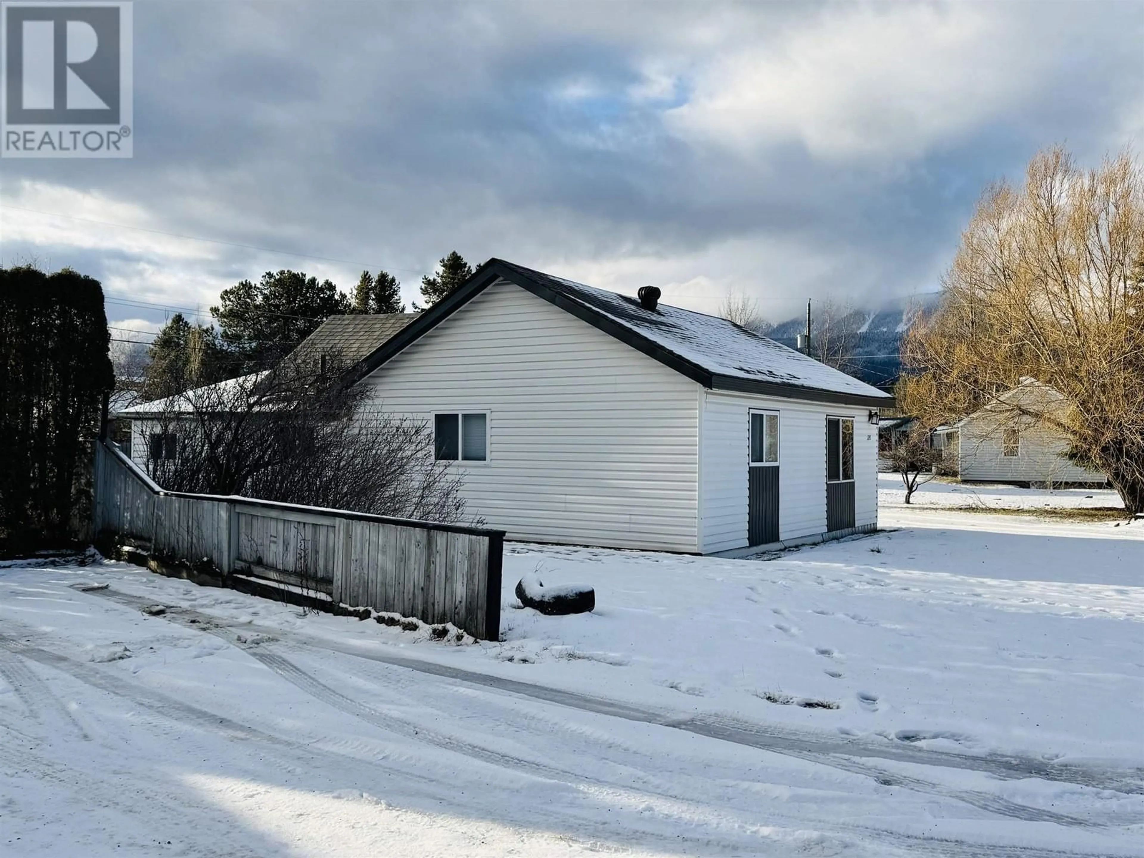 A pic from outside/outdoor area/front of a property/back of a property/a pic from drone, mountain view for 1245 6TH AVENUE, Valemount British Columbia V0E2Z0