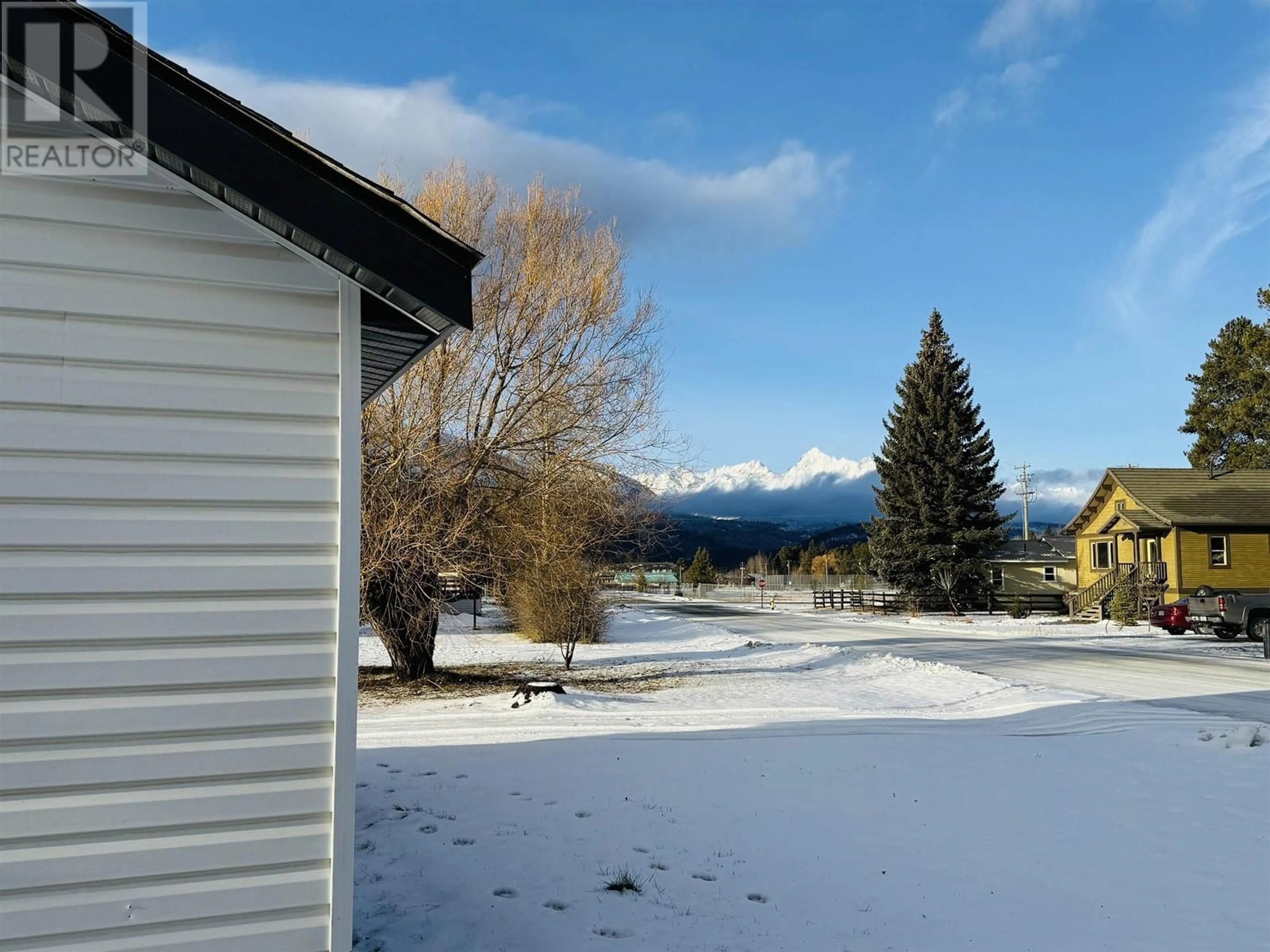 A pic from outside/outdoor area/front of a property/back of a property/a pic from drone, mountain view for 1245 6TH AVENUE, Valemount British Columbia V0E2Z0