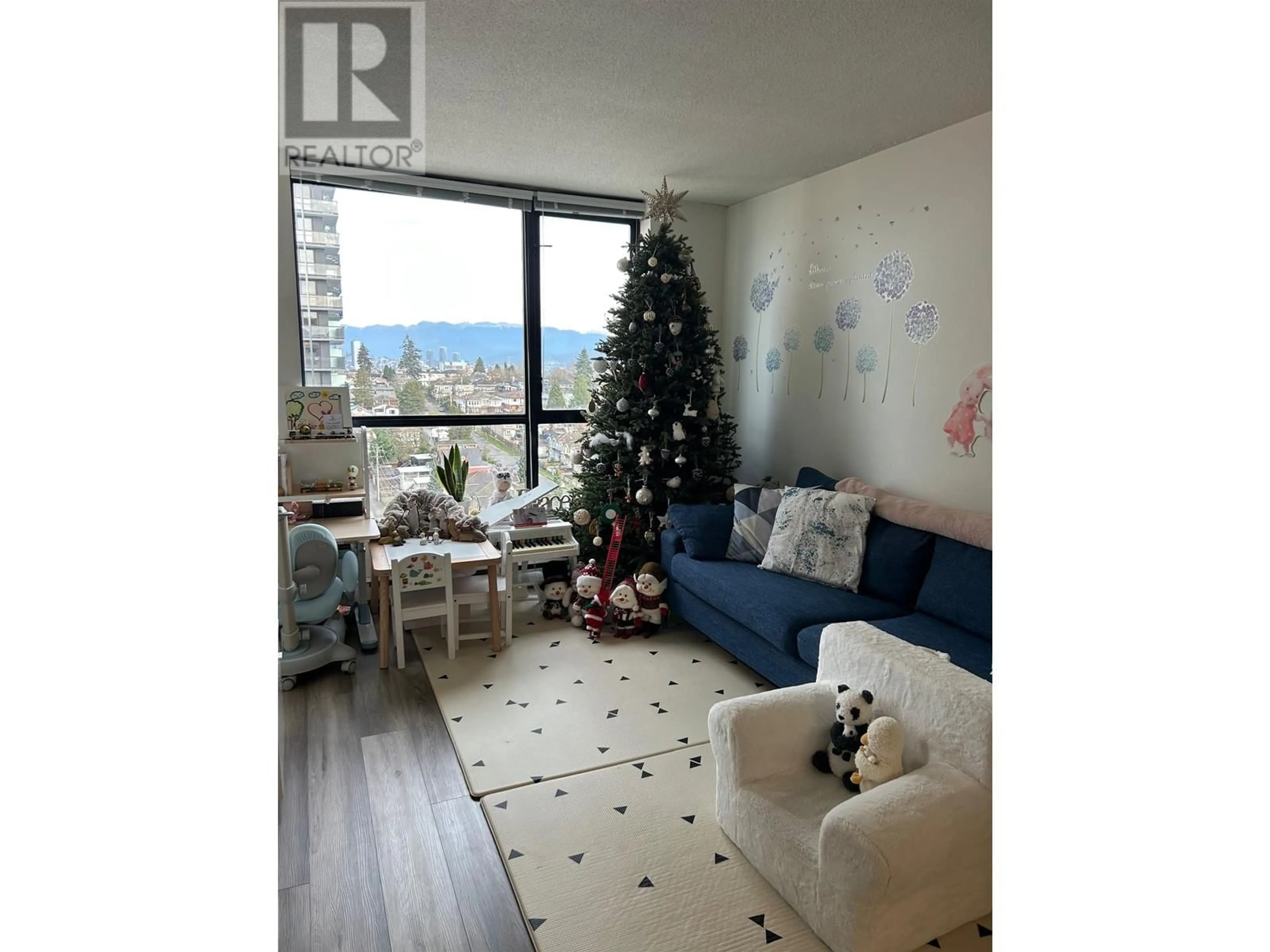 Living room with furniture, wood/laminate floor for 1507 - 3438 VANNESS AVENUE, Vancouver British Columbia V5R6E7