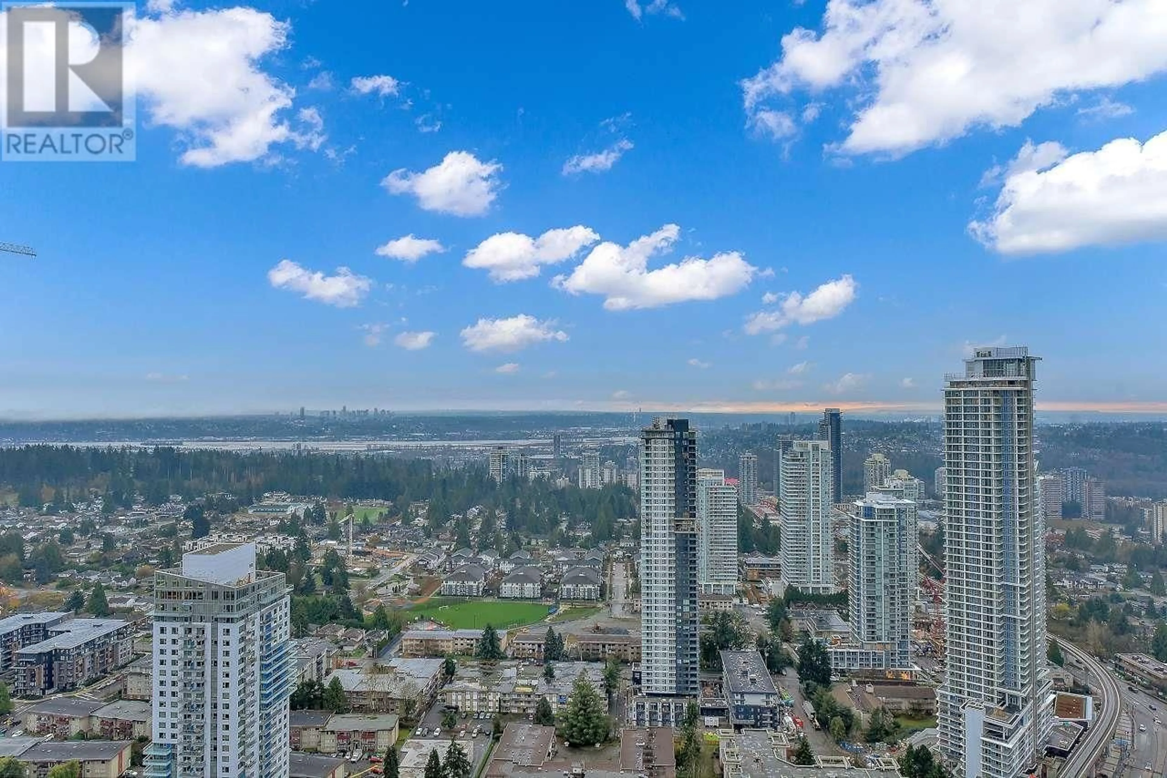 A pic from outside/outdoor area/front of a property/back of a property/a pic from drone, city buildings view from balcony for 4307 567 CLARKE ROAD, Coquitlam British Columbia V3J3Y2