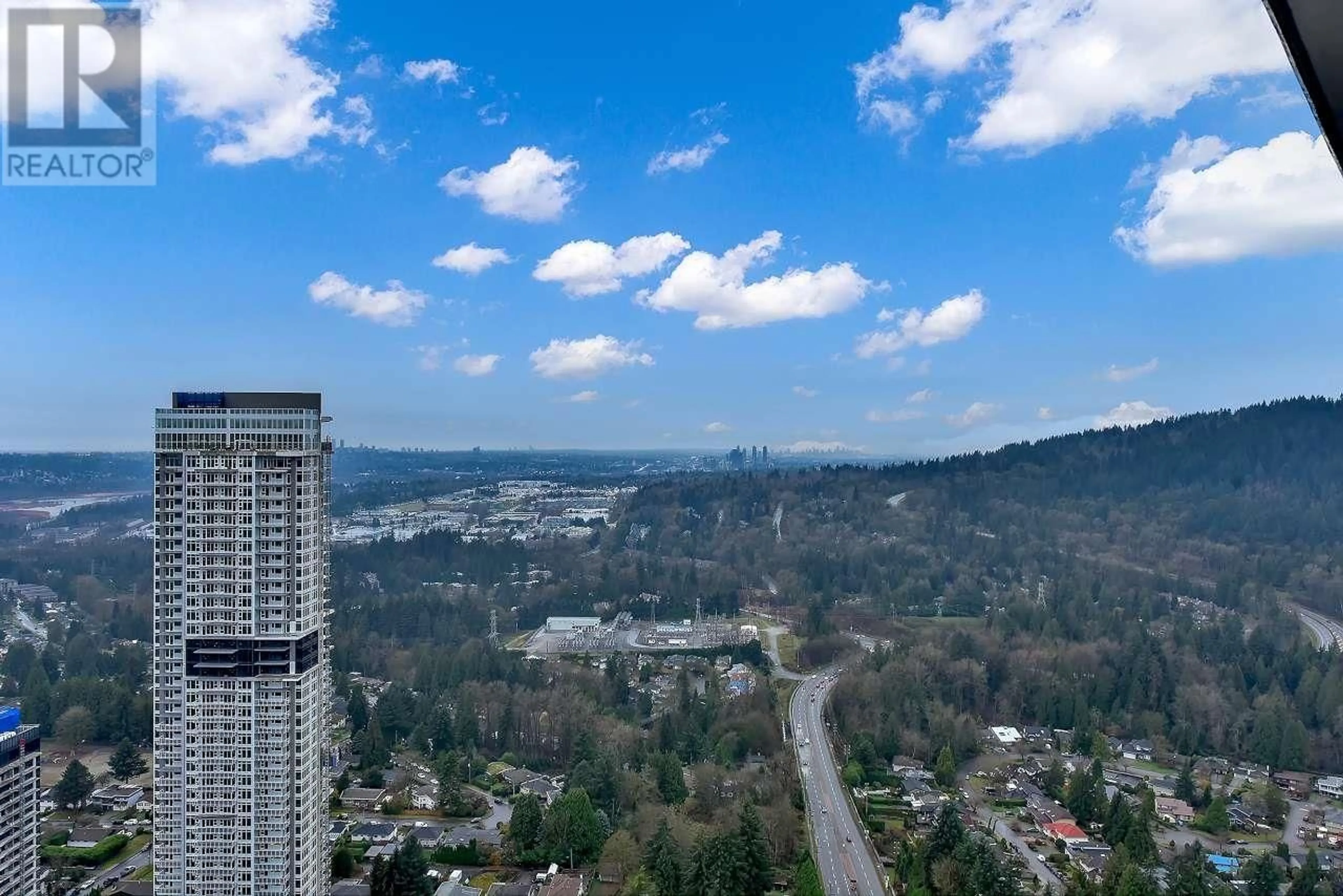 A pic from outside/outdoor area/front of a property/back of a property/a pic from drone, city buildings view from balcony for 4307 567 CLARKE ROAD, Coquitlam British Columbia V3J3Y2