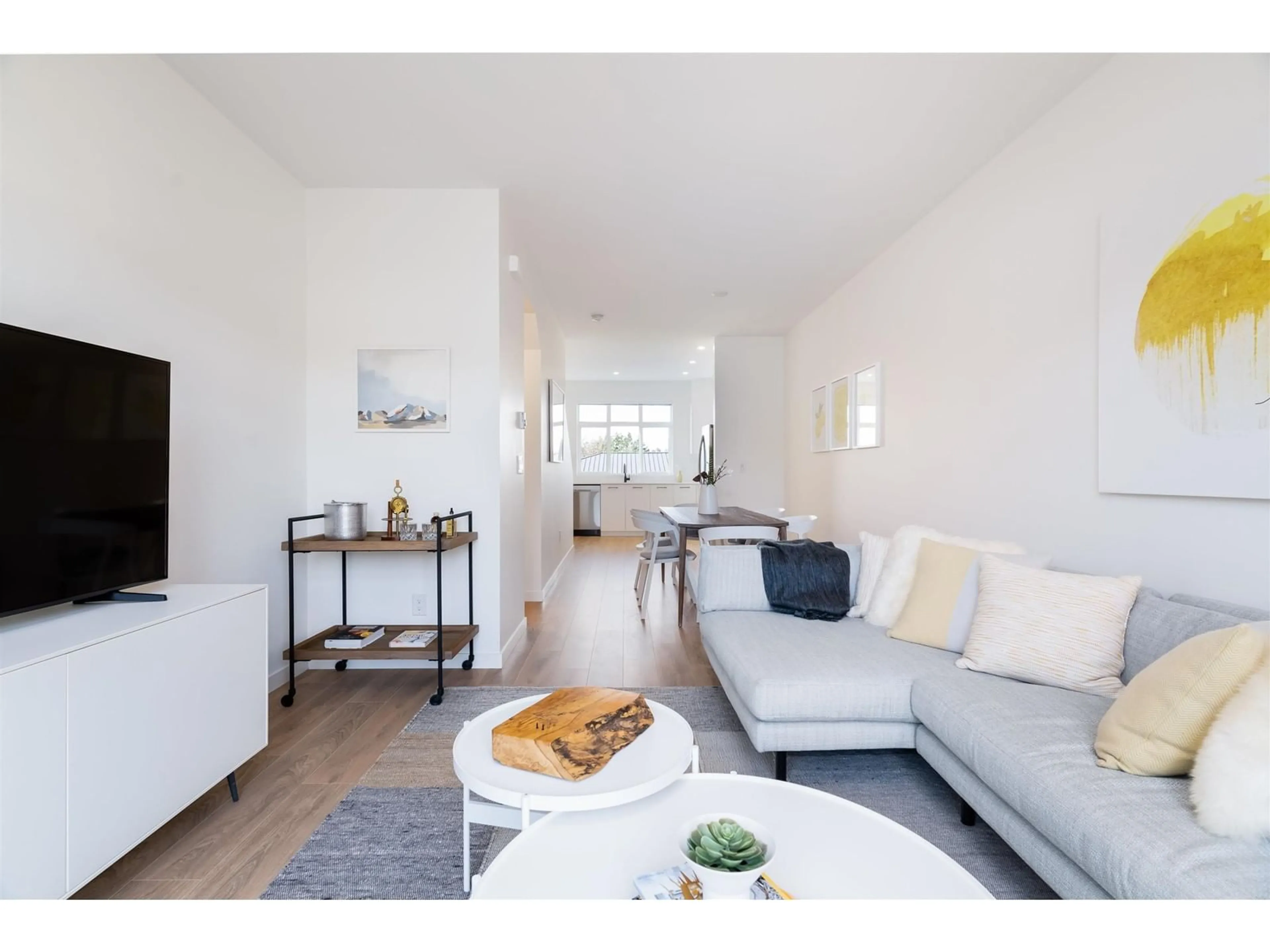 Living room with furniture, wood/laminate floor for 5 15255 SITKA DRIVE, Surrey British Columbia V3S0B1