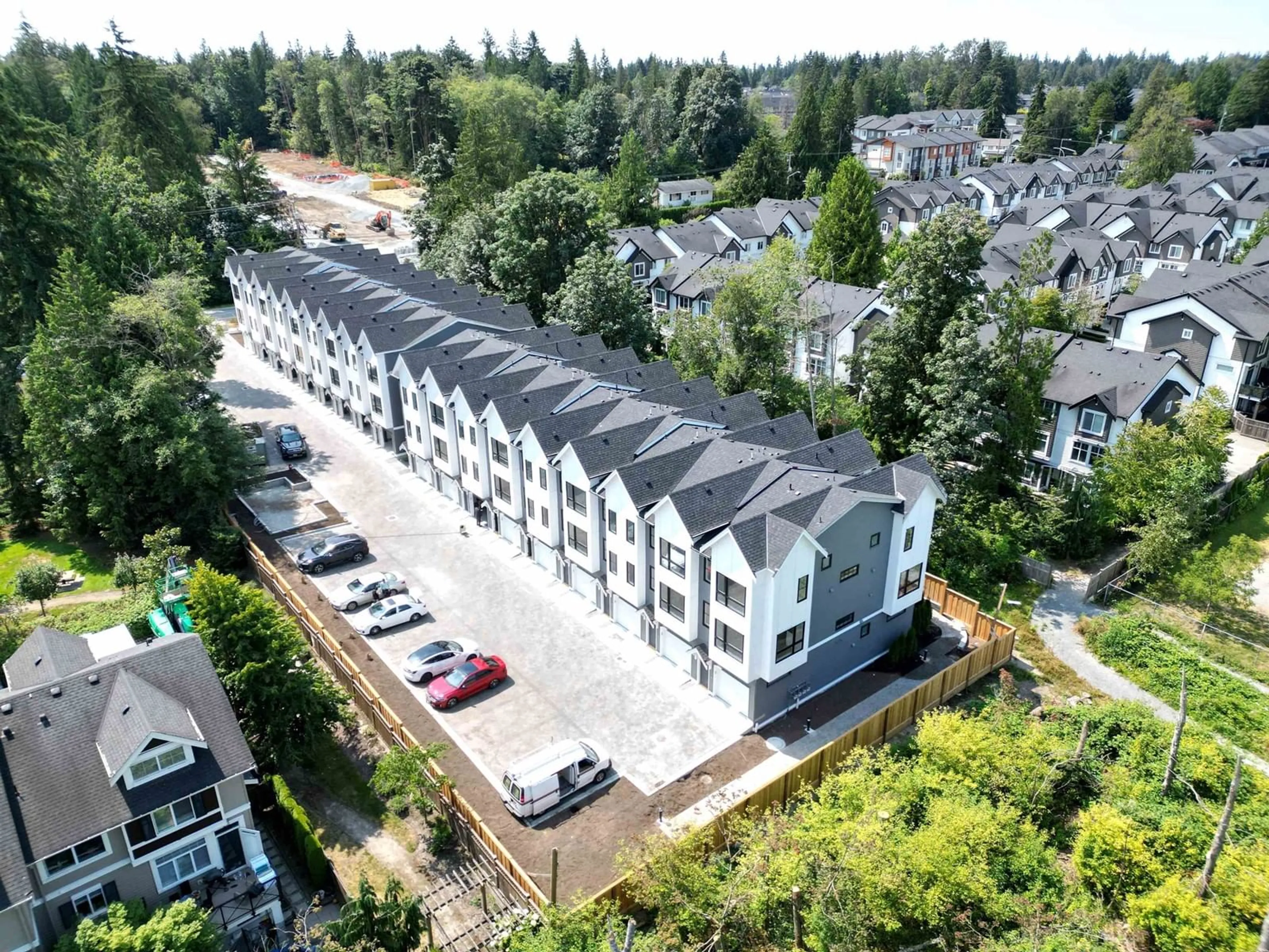 A pic from outside/outdoor area/front of a property/back of a property/a pic from drone, unknown for 4 14311 60 AVENUE, Surrey British Columbia V3X2N4