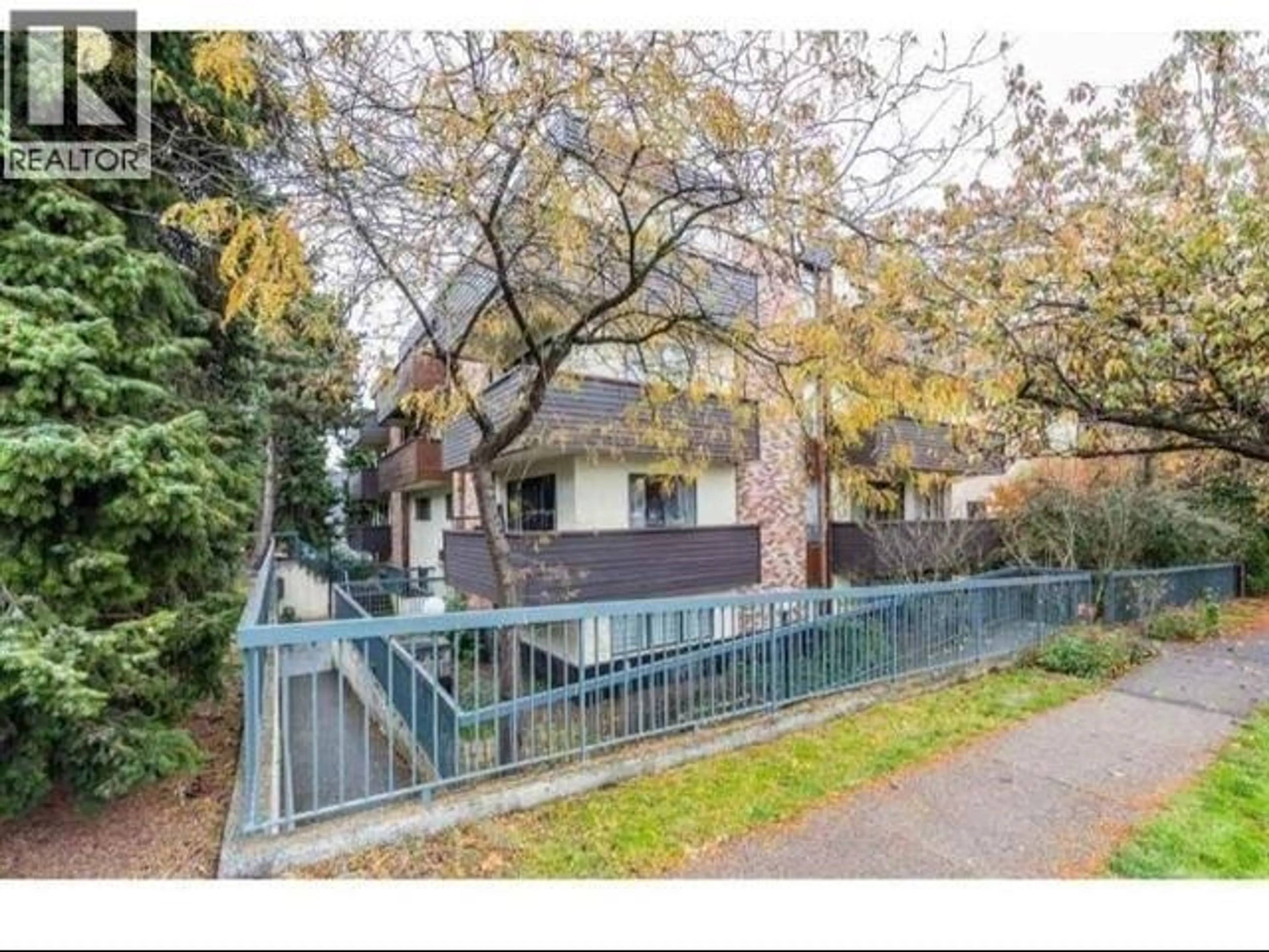 A pic from outside/outdoor area/front of a property/back of a property/a pic from drone, street for 302 1296 W 70TH STREET, Vancouver British Columbia V6P2Y5