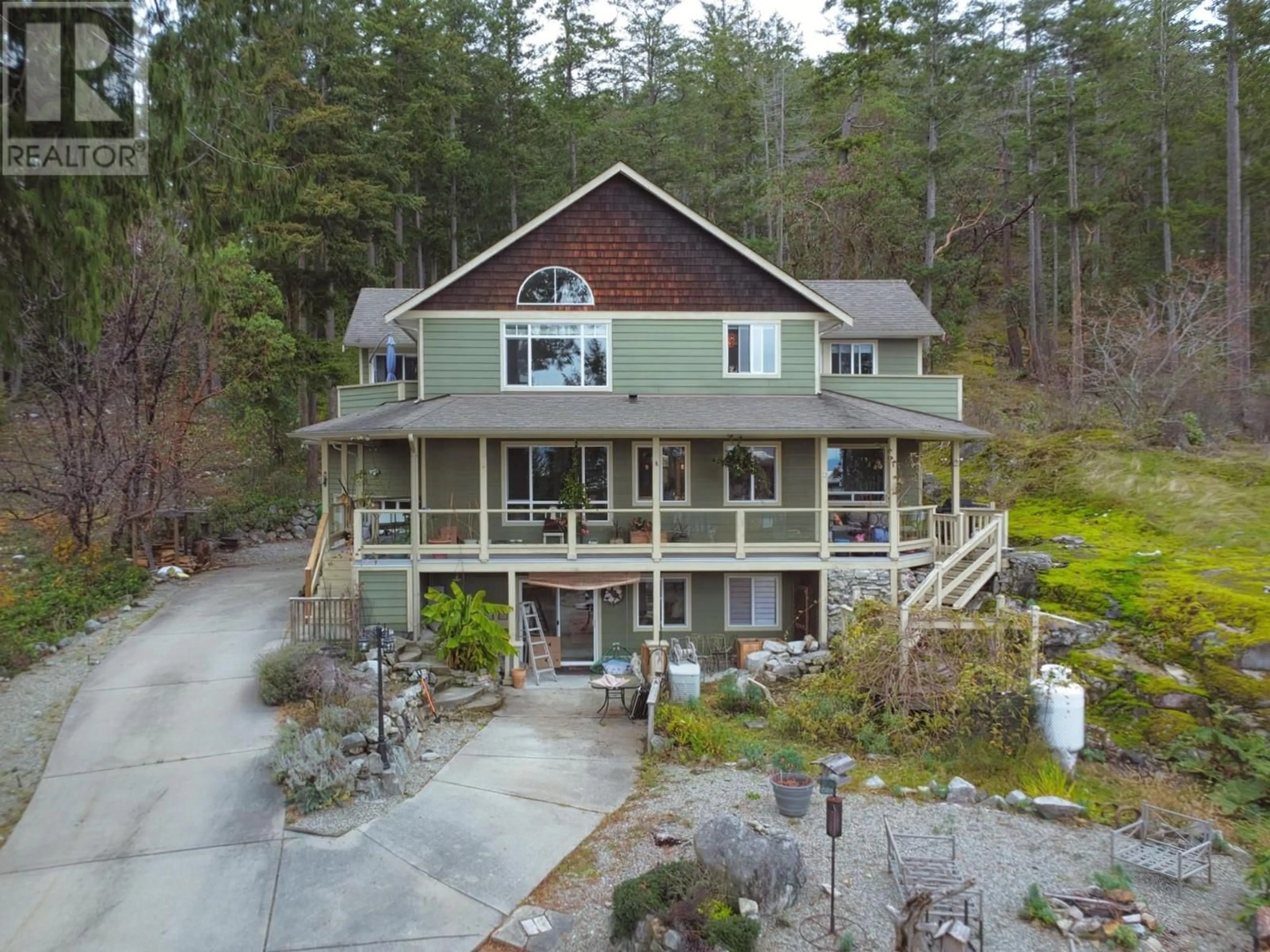 A pic from outside/outdoor area/front of a property/back of a property/a pic from drone, water/lake/river/ocean view for 4177 JOHNSTON HEIGHTS DRIVE, Garden Bay British Columbia V0N1S1