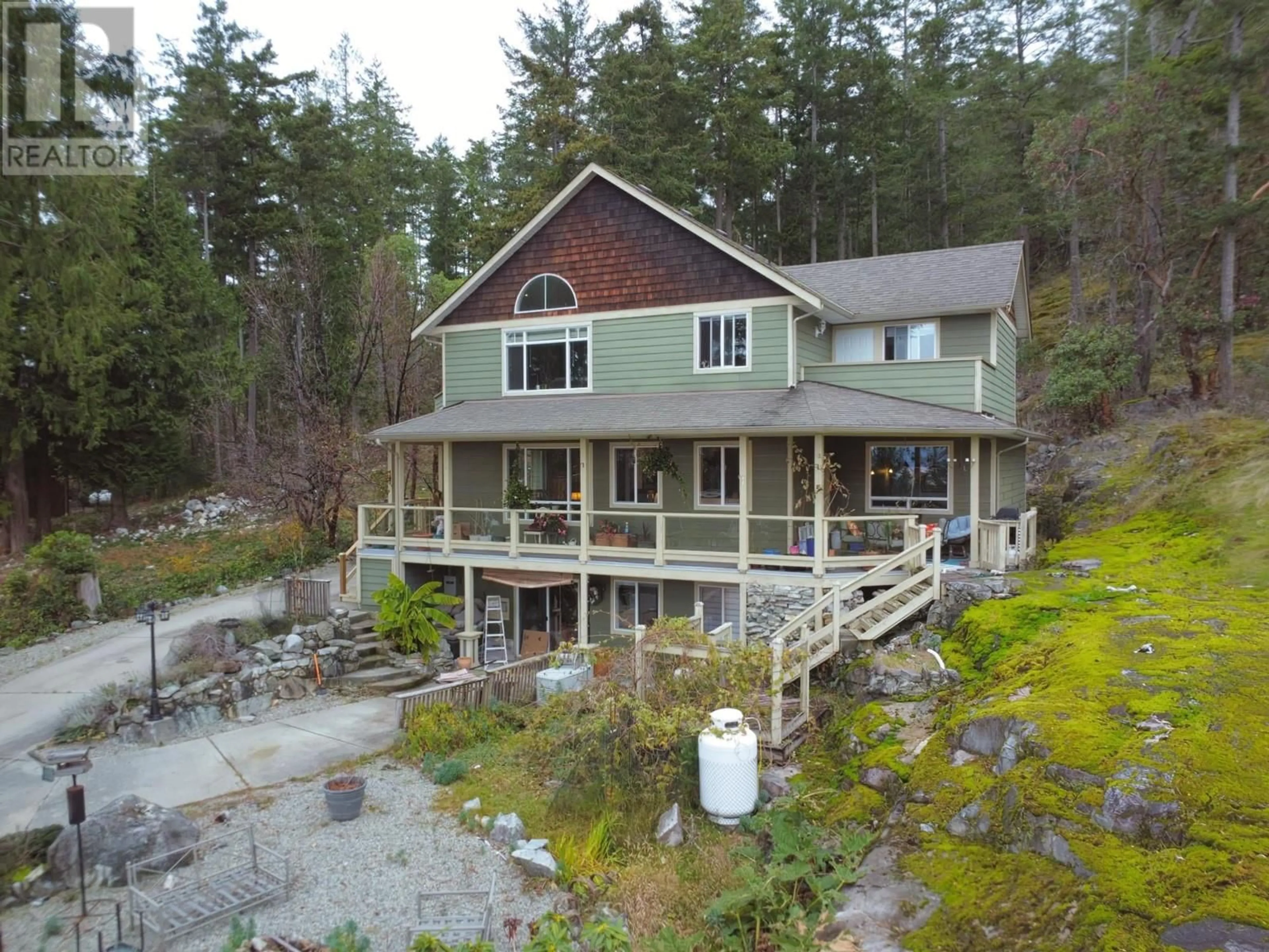 A pic from outside/outdoor area/front of a property/back of a property/a pic from drone, water/lake/river/ocean view for 4177 JOHNSTON HEIGHTS DRIVE, Garden Bay British Columbia V0N1S1