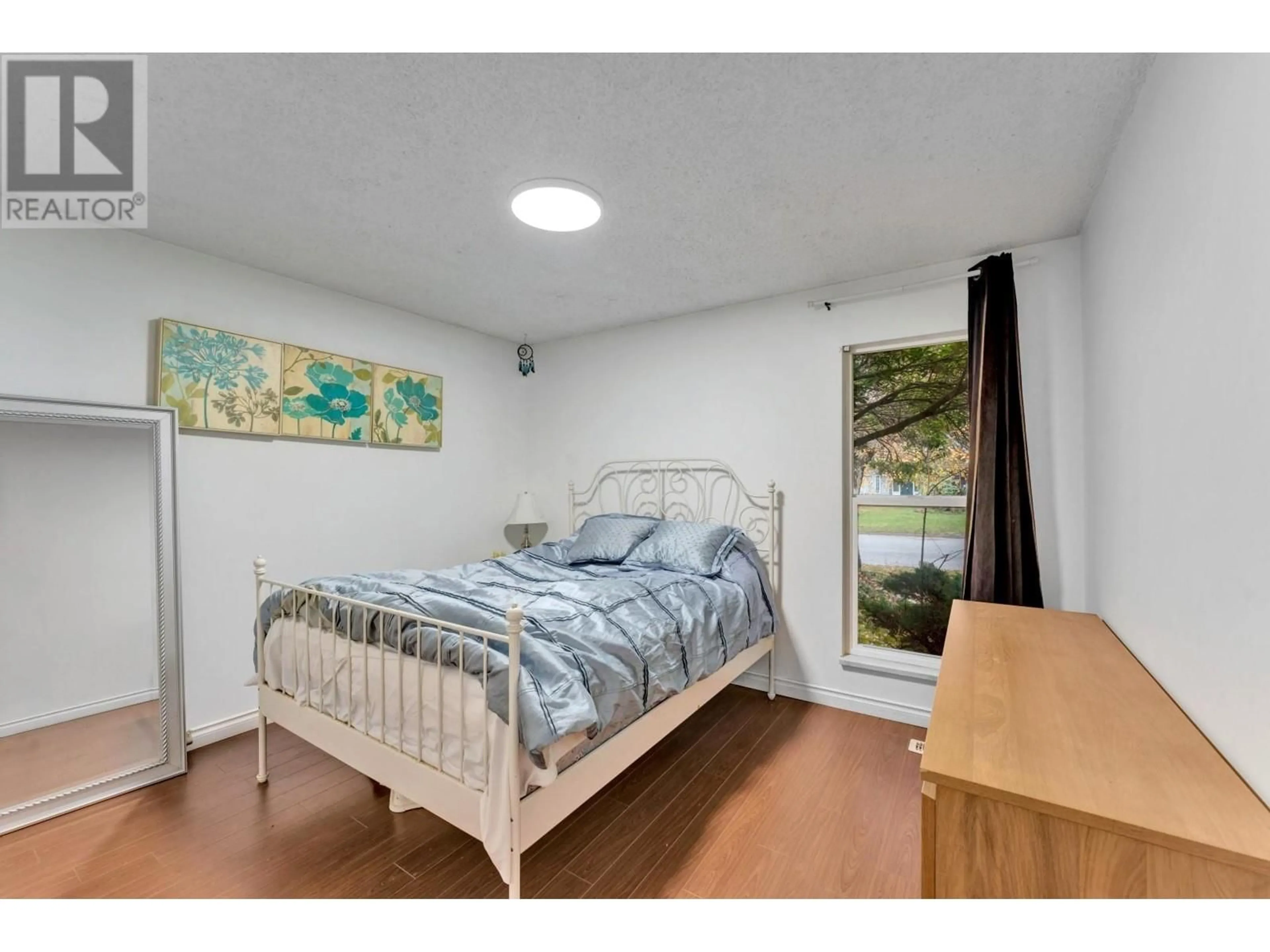 Bedroom with bed, wood/laminate floor for 5143 GALWAY DRIVE, Delta British Columbia V4M3R4