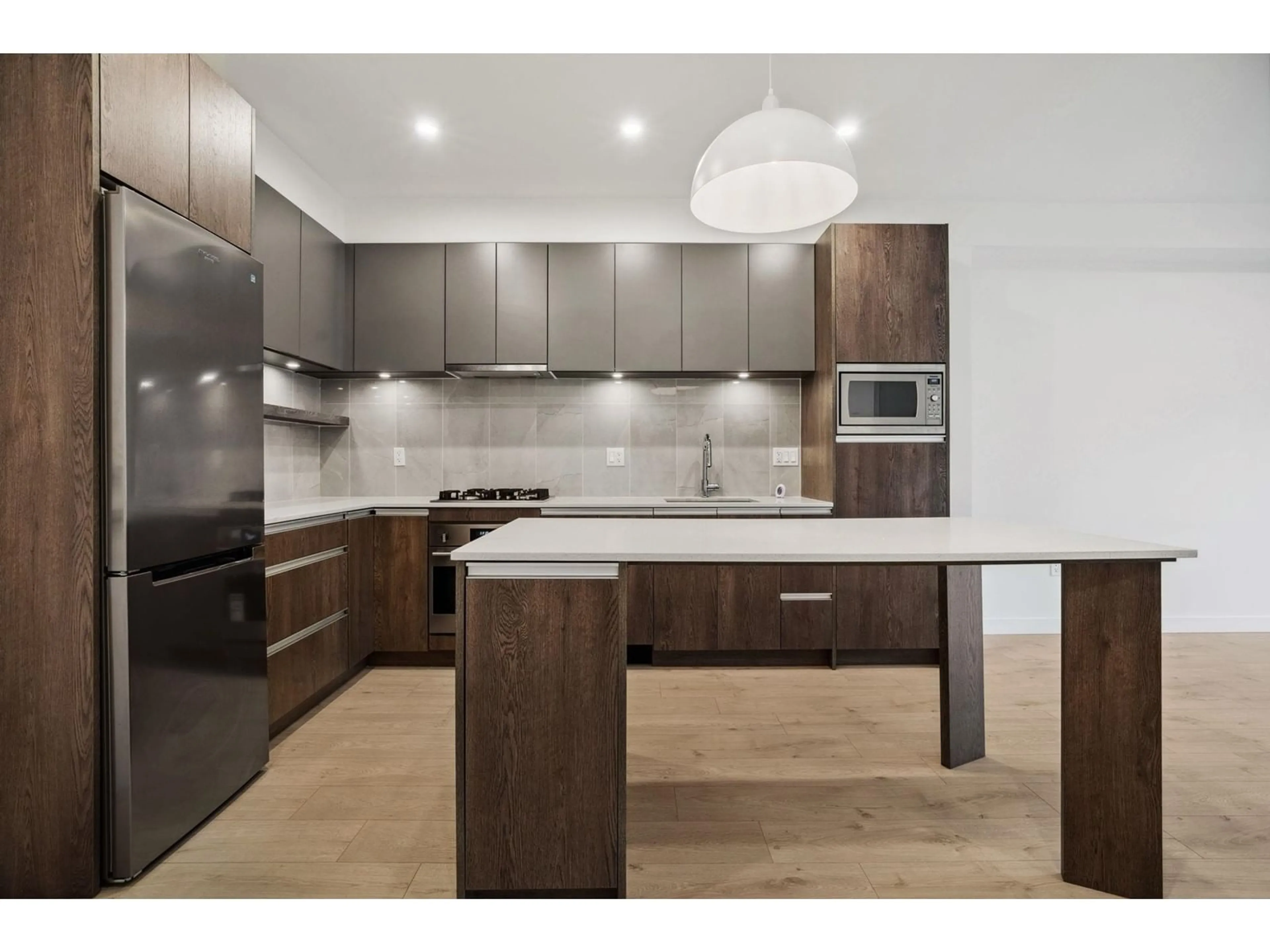 Open concept kitchen, unknown for 208 14225 103A AVENUE, Surrey British Columbia V3T0T4