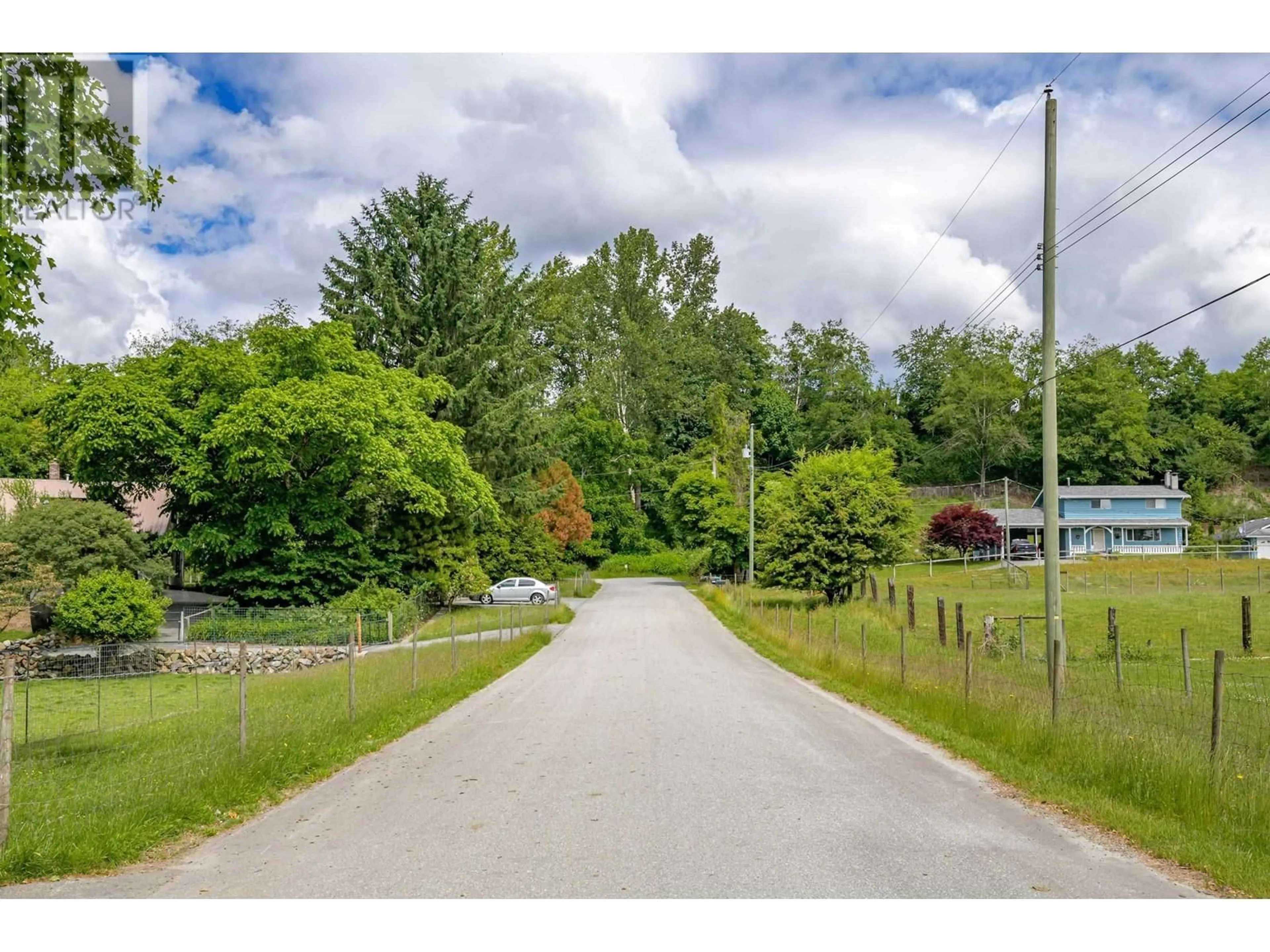 A pic from outside/outdoor area/front of a property/back of a property/a pic from drone, street for 10177 267 STREET, Maple Ridge British Columbia V2W1R1