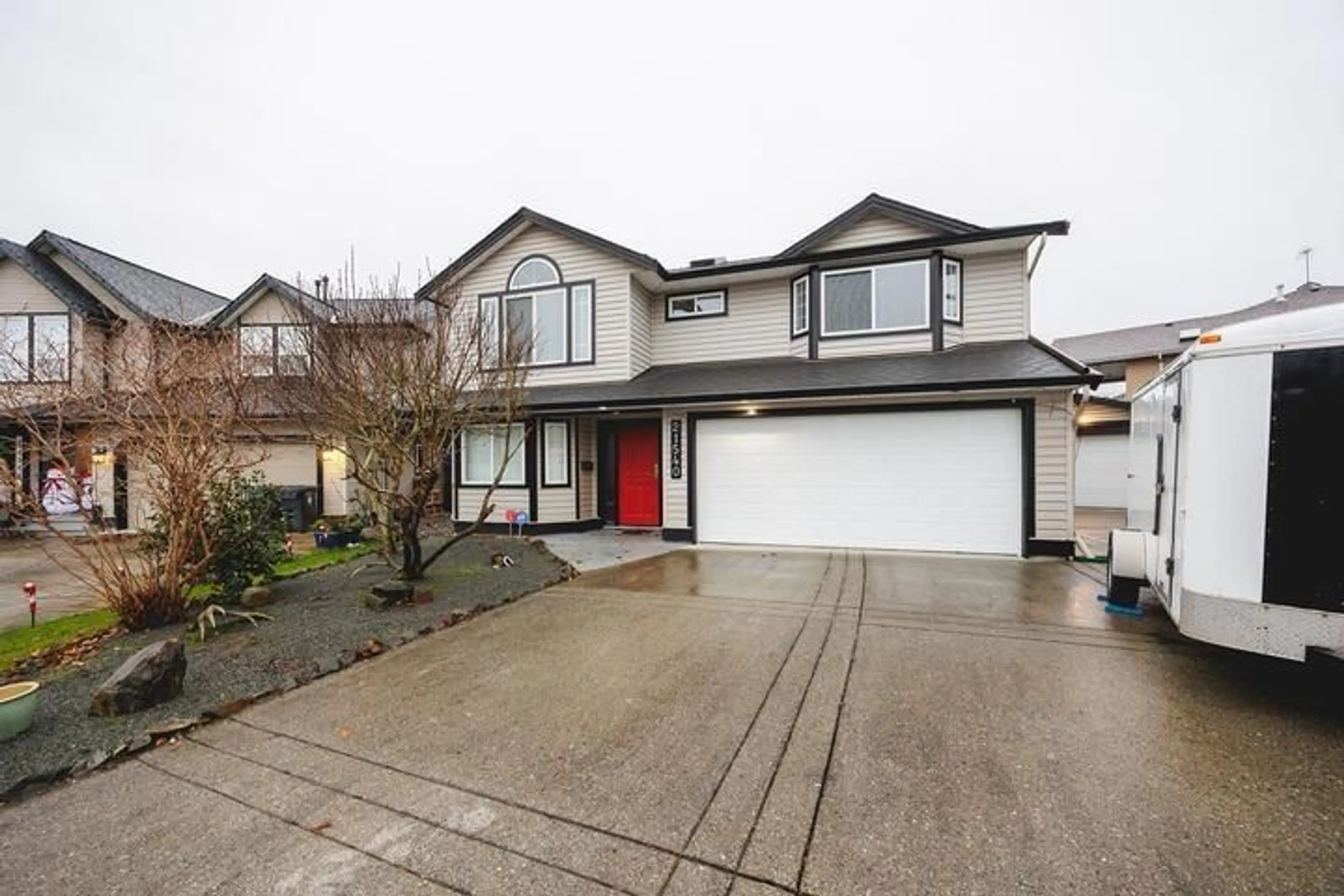 Home with vinyl exterior material, street for 21540 50A AVENUE, Langley British Columbia V3A8W4